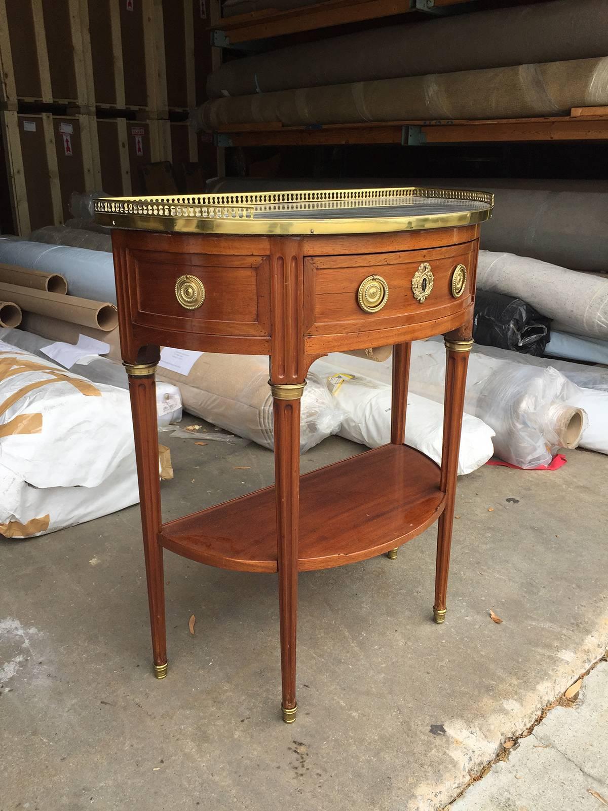 18th-19th century Louis XVI style marble-top and brass-mounted mahogany console.
