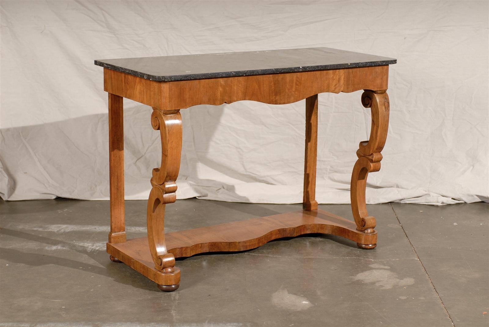 19th century Charles X console with black marble top, circa 1825.