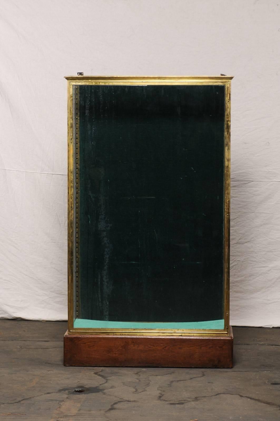 Early 20th century large bronze and glass vitrine cabinet.