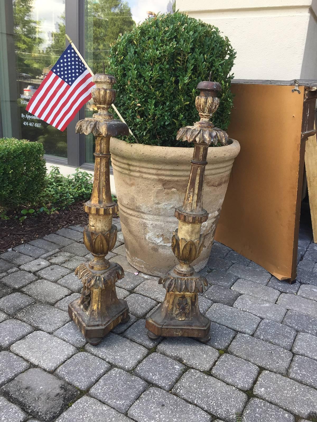 Pair of 18th century tall Italian polychrome candlesticks.