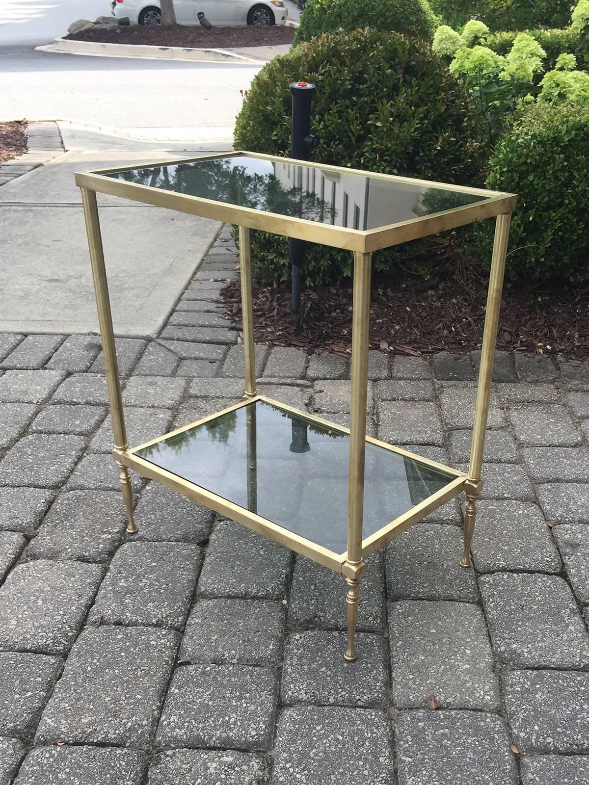 Mid-Century brass and glass two-tier side table.