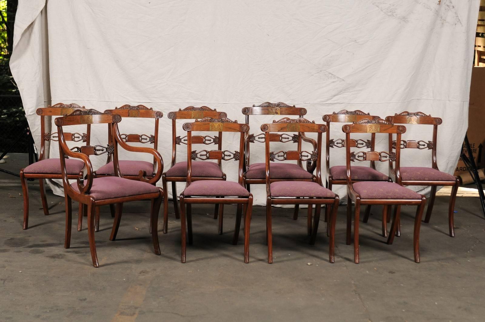 Set of Ten Regency Style Dining Chairs, Circa 1900, Rosewood, Mahogany and Brass Inlay, Beautiful Carving, Very Comfortable, Large Seats Eight Side Chairs, Two Armchairs. 