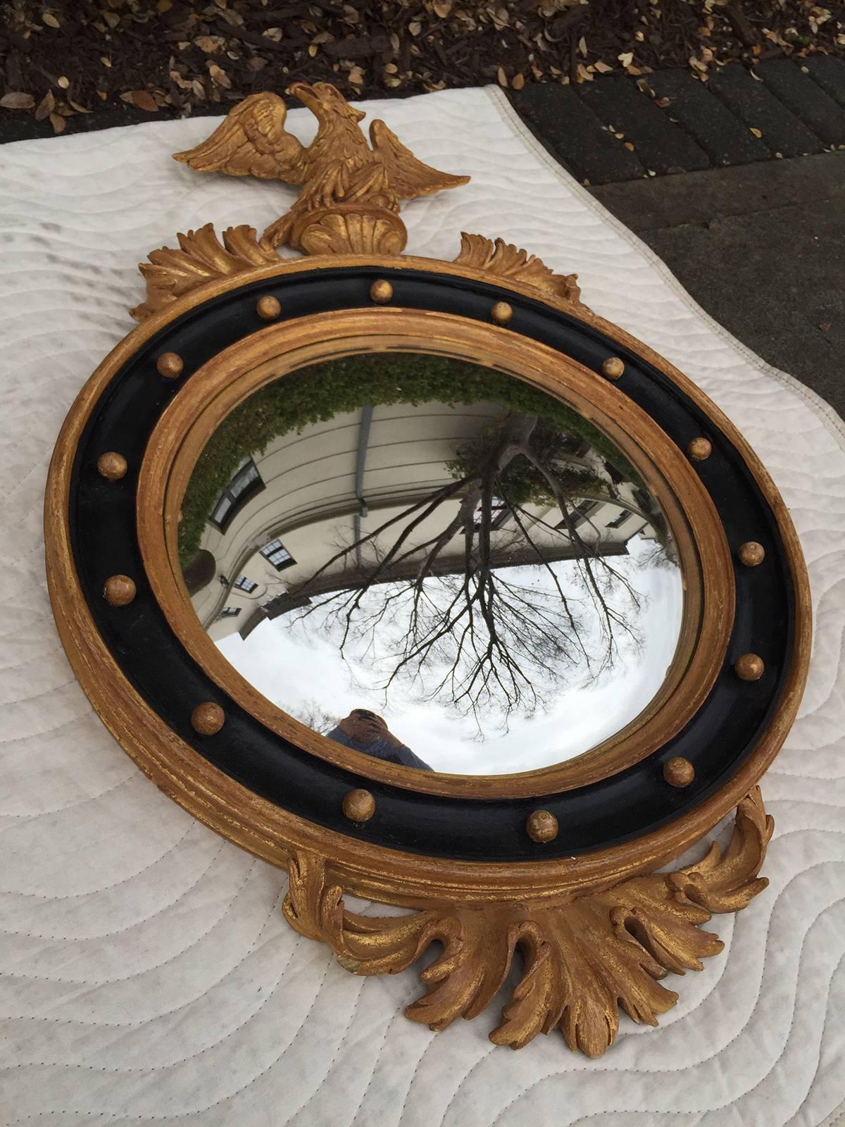 Pair of 20th century, circa 1950. Italian convex mirrors, stamped Made in Italy.