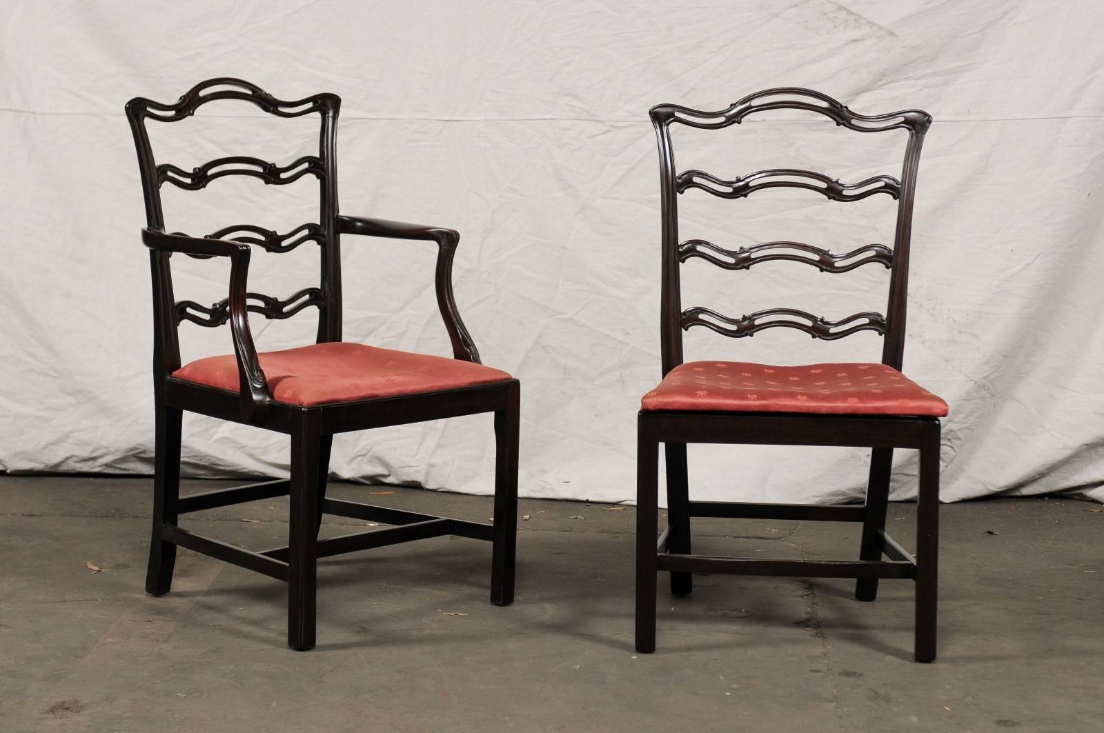 Set of eight George III style ribbon back mahogany dining chairs, six sides, two-arm
Measure: seat height 18" tall, arm height 28" tall.