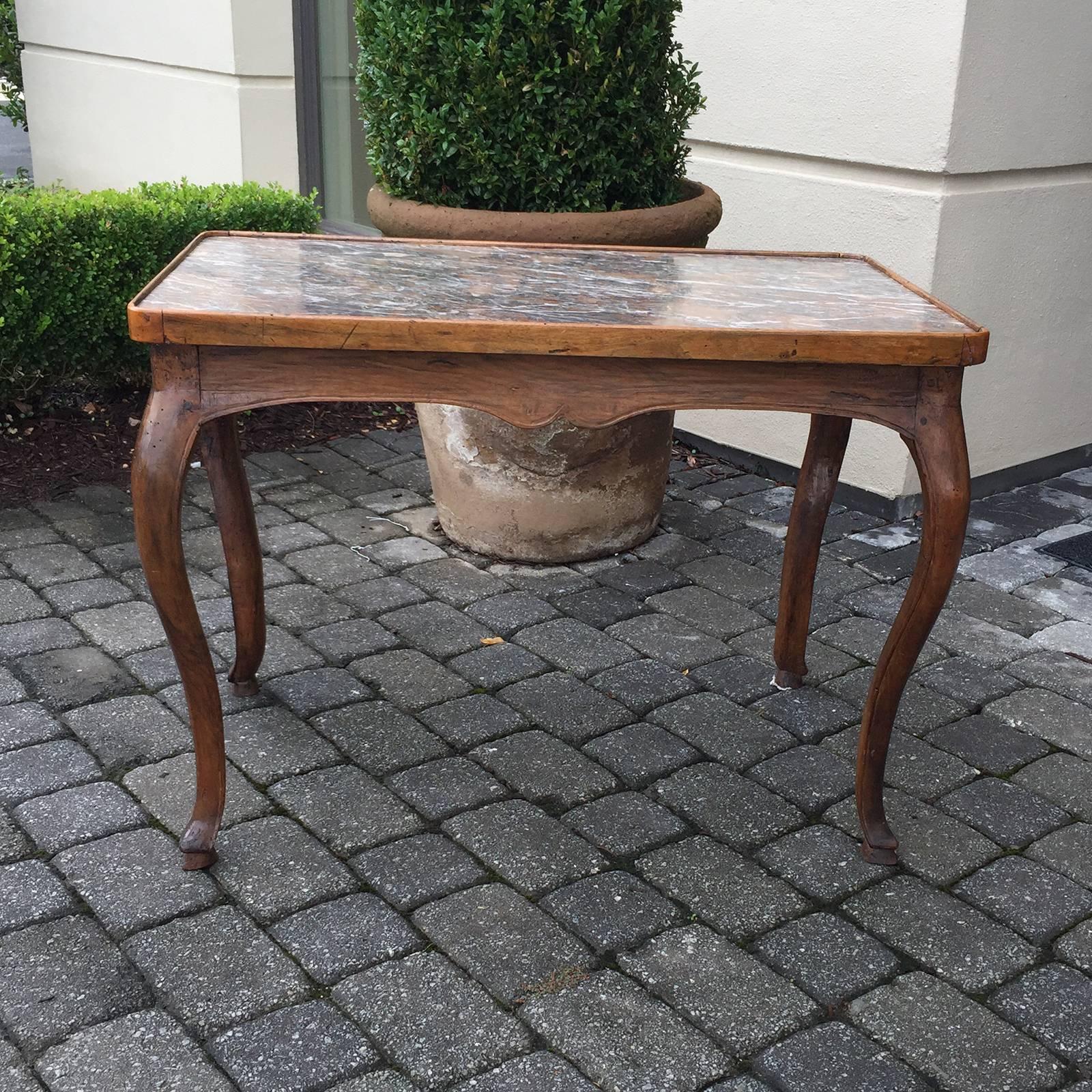 18th-19th century French Louis XV Provincial style fruitwood table.
