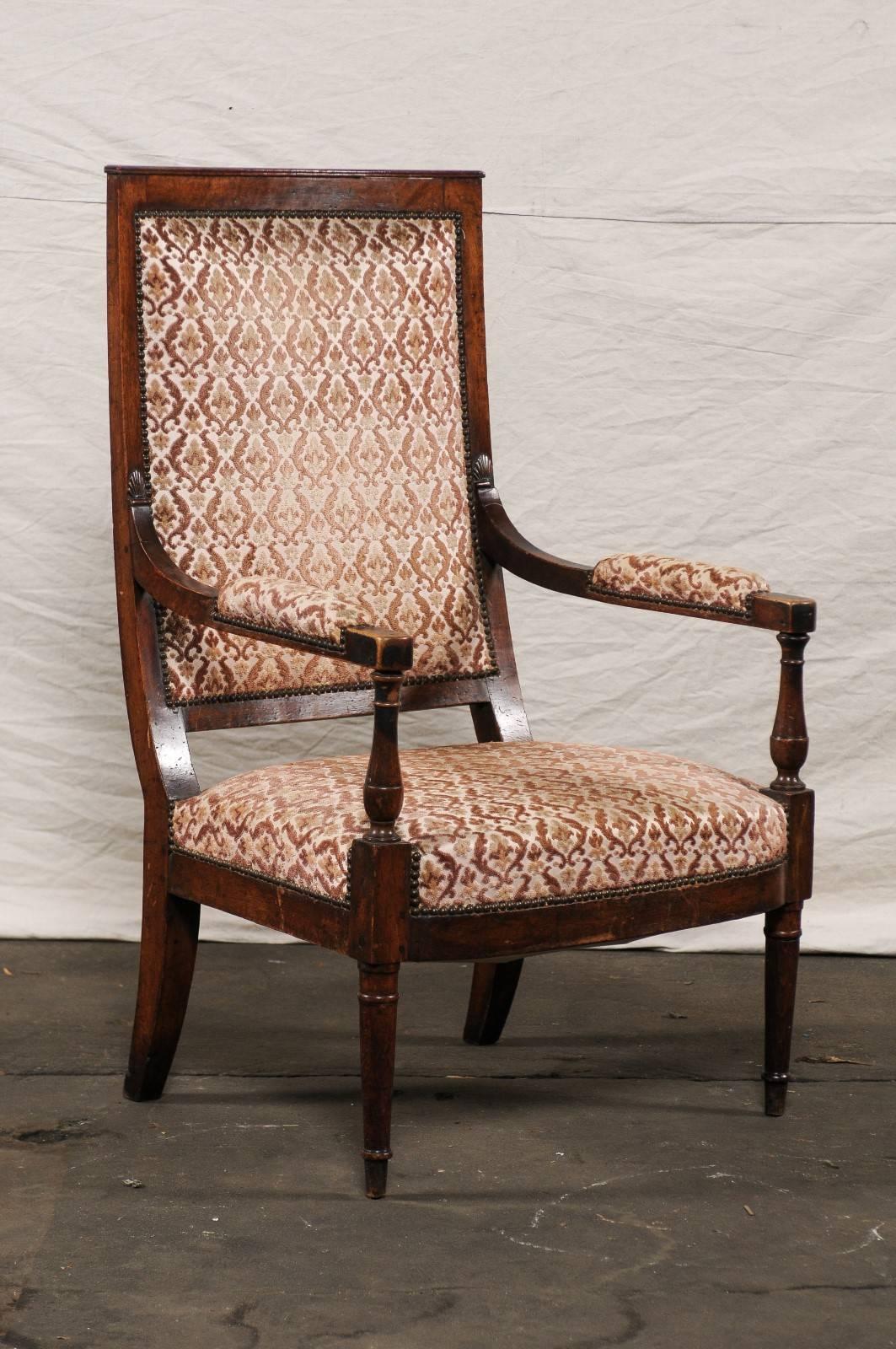 19th century French chair, very dramatic in scale measure: seat height 17.5" tall, arm height 26.25 " tall. Overall dimensions, 26.5" W x 21.5" D x 44.75" T.