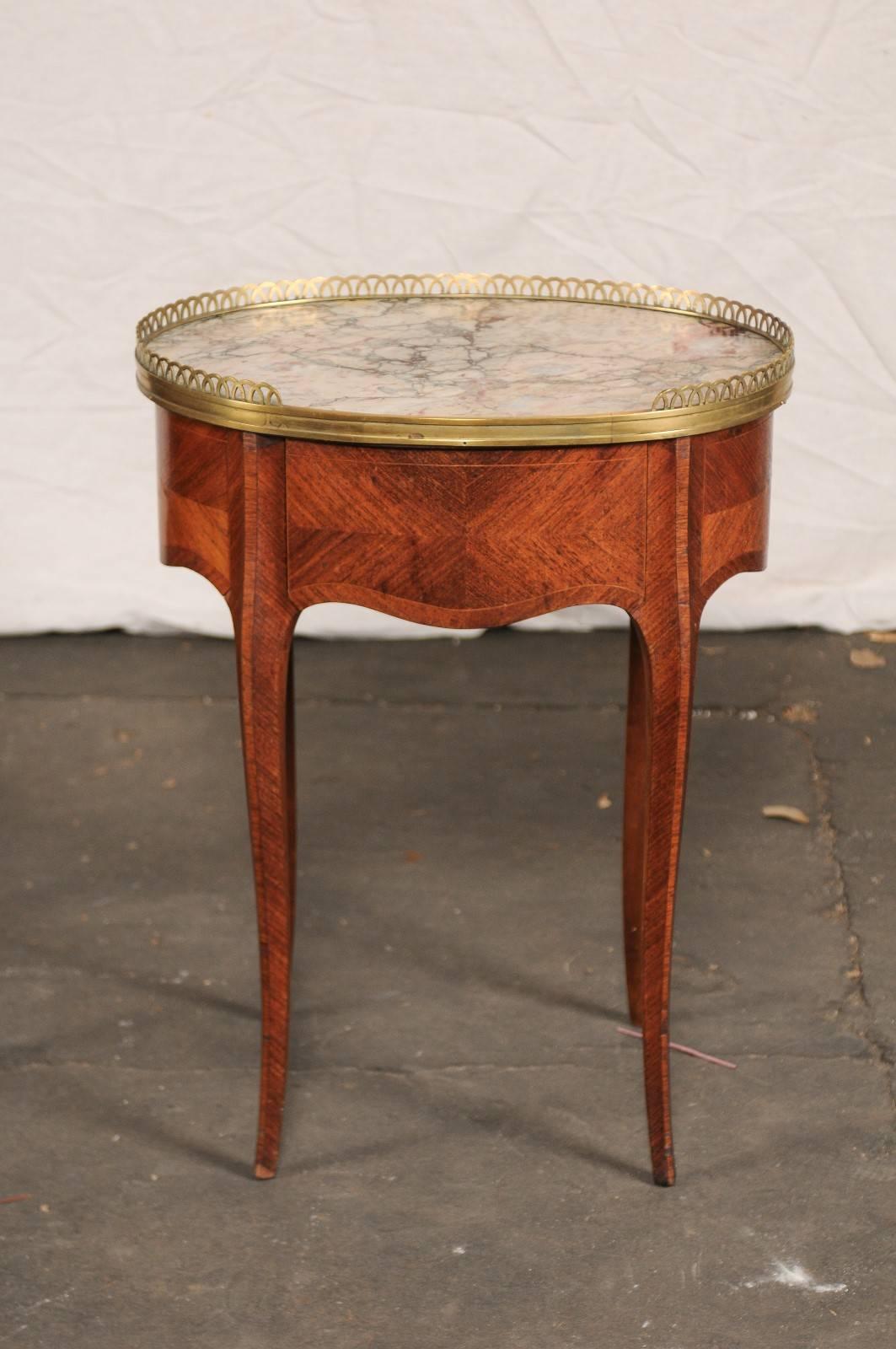 Early 20th Century Pair of circa 1900 French Marble-Top, Bronze Gallery Tables with Drawers