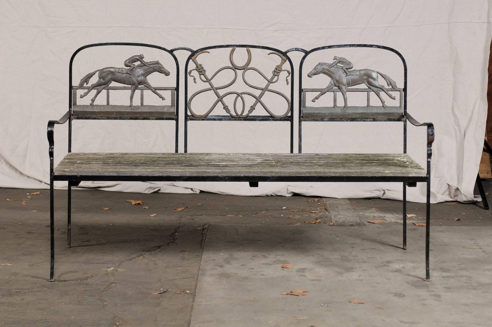 20th century iron and brass Equestrian bench, wooden seat, measure: seat height- 18
