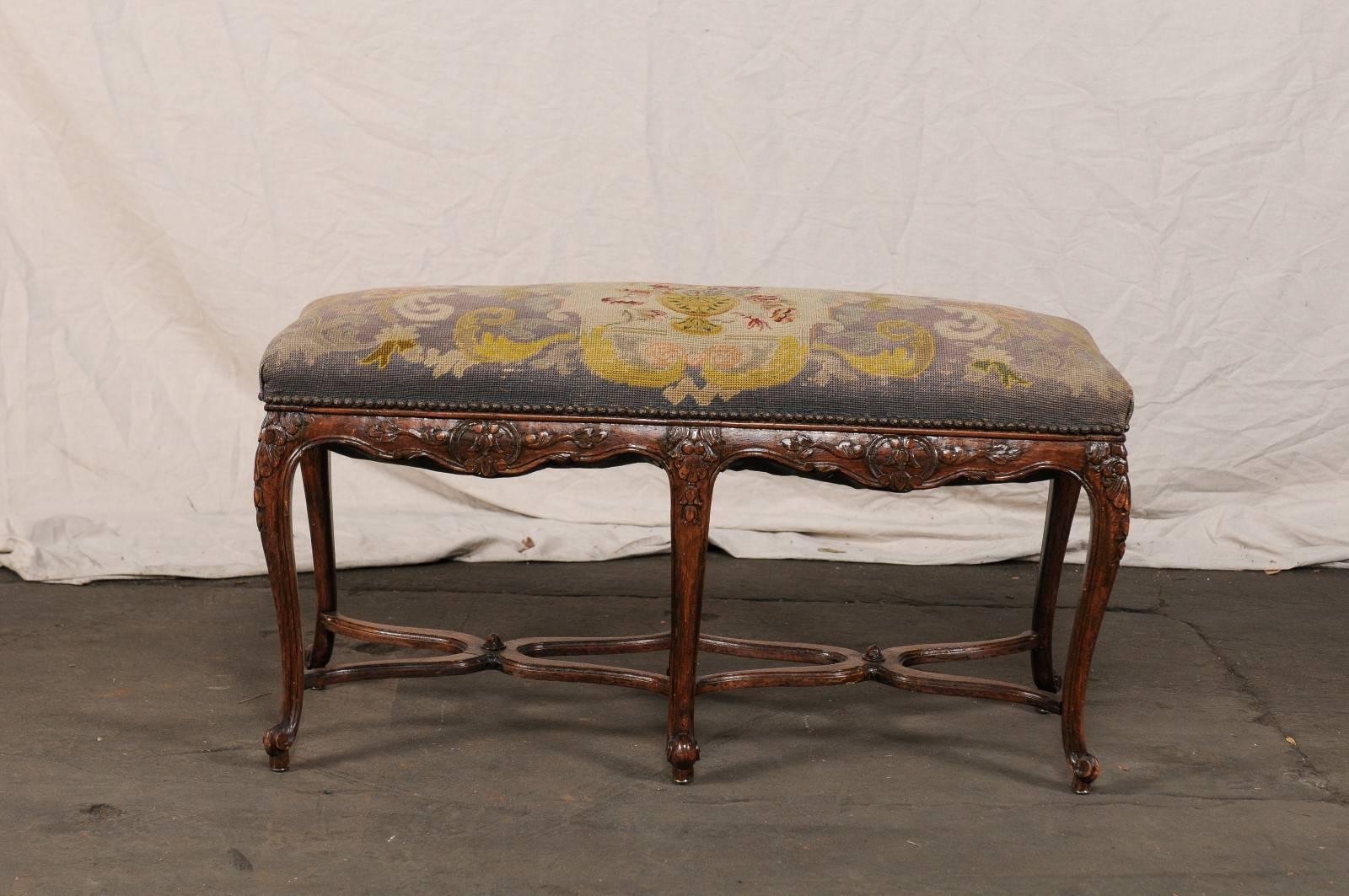 19th-20th century French Louis XV style needlepoint bench.