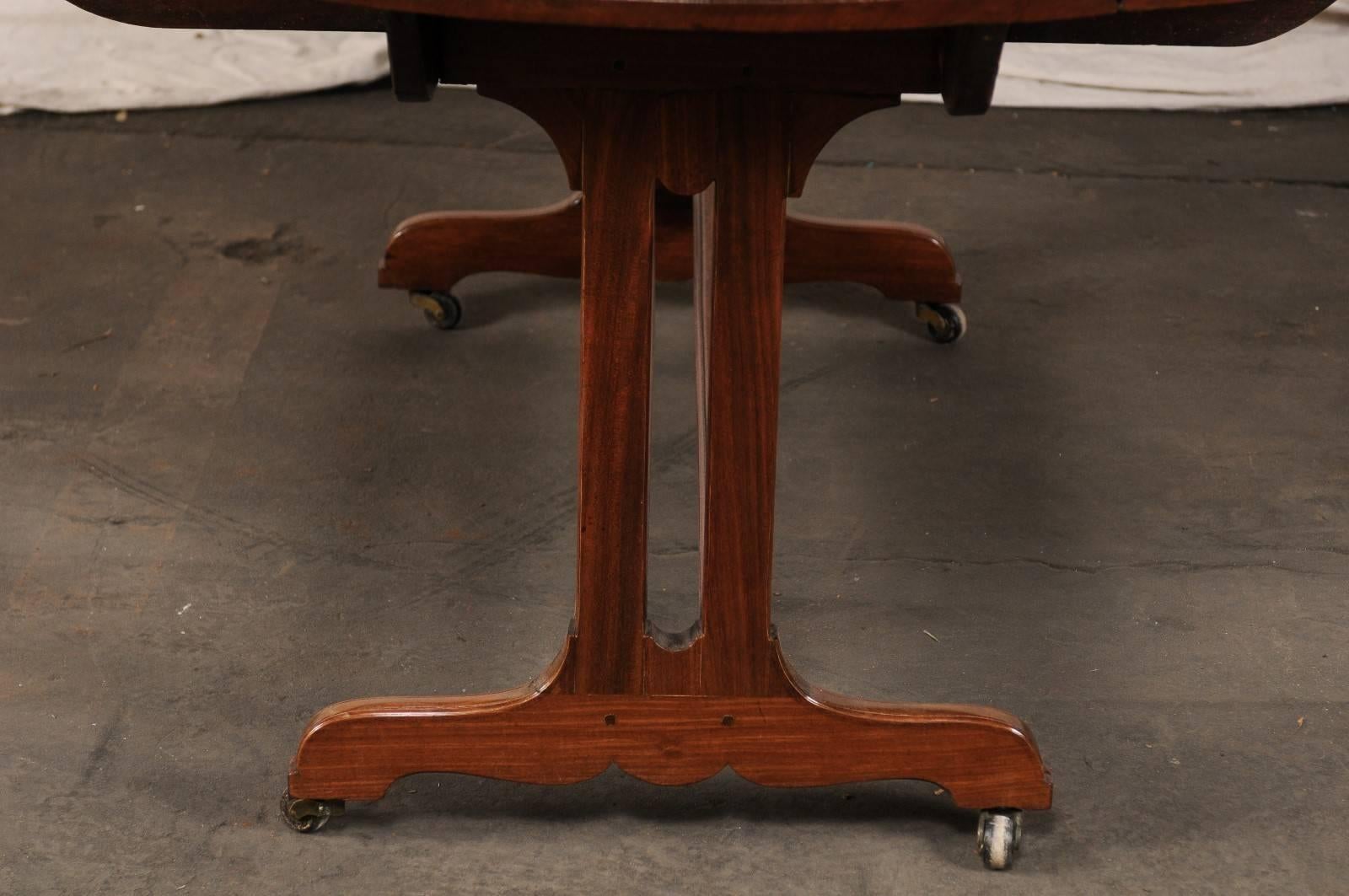 Late 19th Century Drop-Leaf Table, Trestle Form Base with Casters For Sale 2