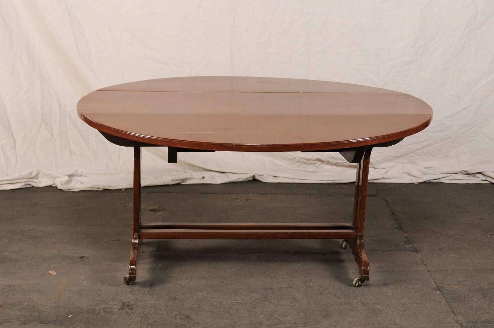 Late 19th Century Drop-Leaf Table, Trestle Form Base with Casters For Sale 5