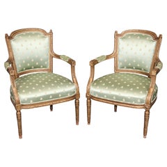 Pair of Antique French Louis XVI Style Gold Carved Armchairs C. 1920's