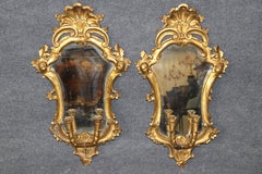 Pair of Early 19th Century Italian Rococo Carved Giltwood Mirrored Wall Sconces