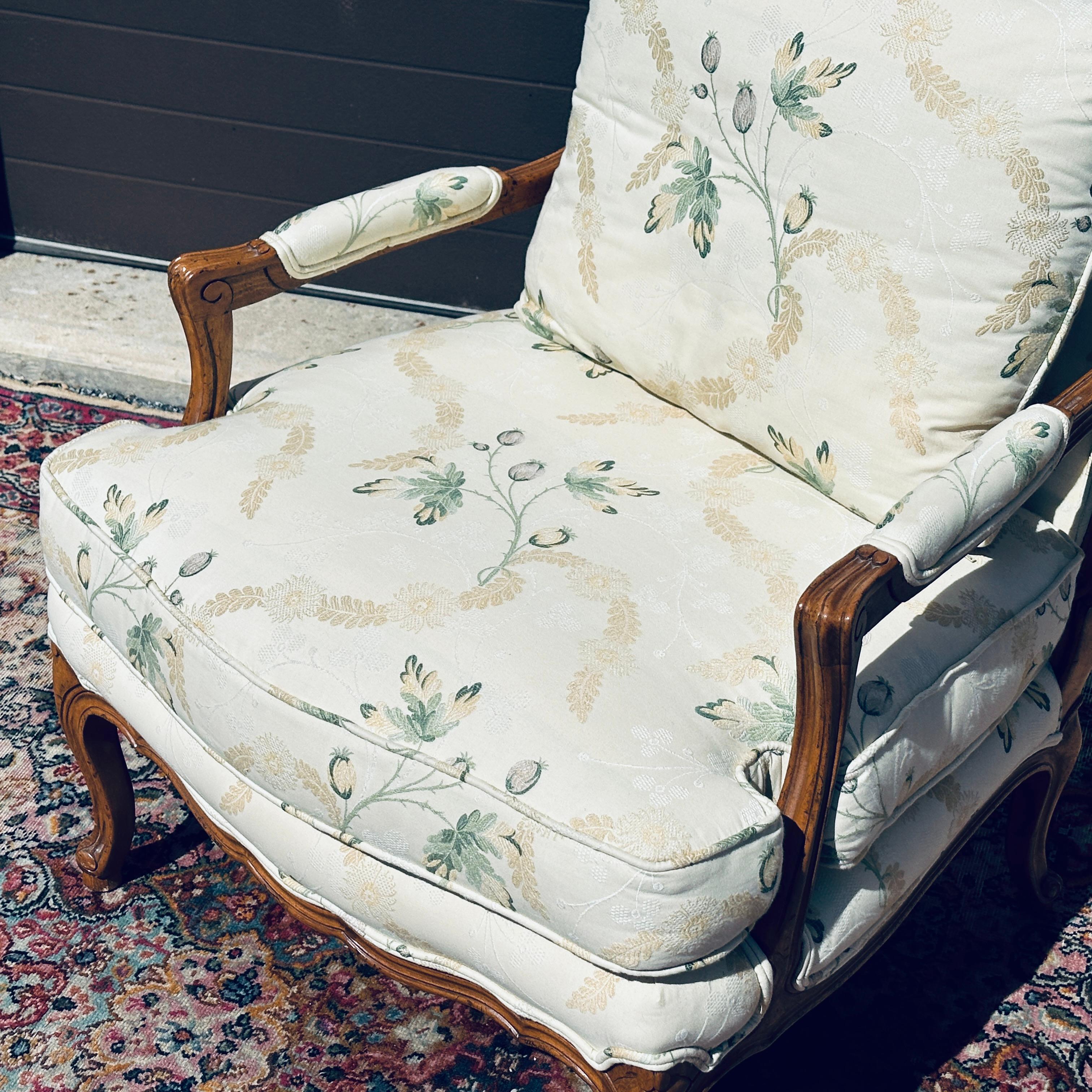 Baker Furniture Co. French Style Carved Open Arm Floral Bergere Chair In Good Condition For Sale In West Chester, PA
