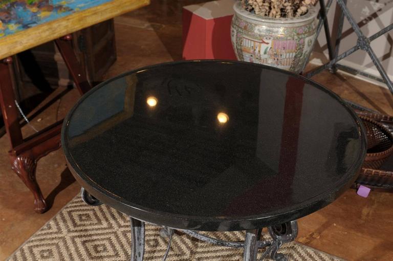 Black Granite and Iron Round Table at 1stDibs