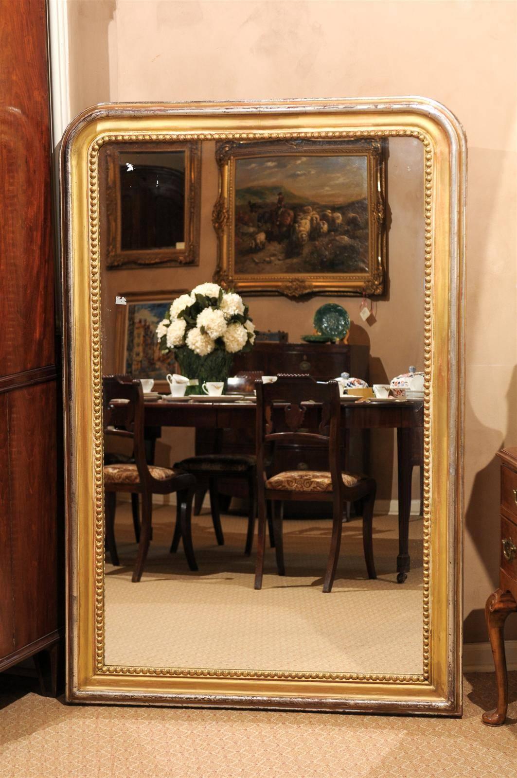 A beautiful 19th century Louis Philippe mirror with inner edge beading.