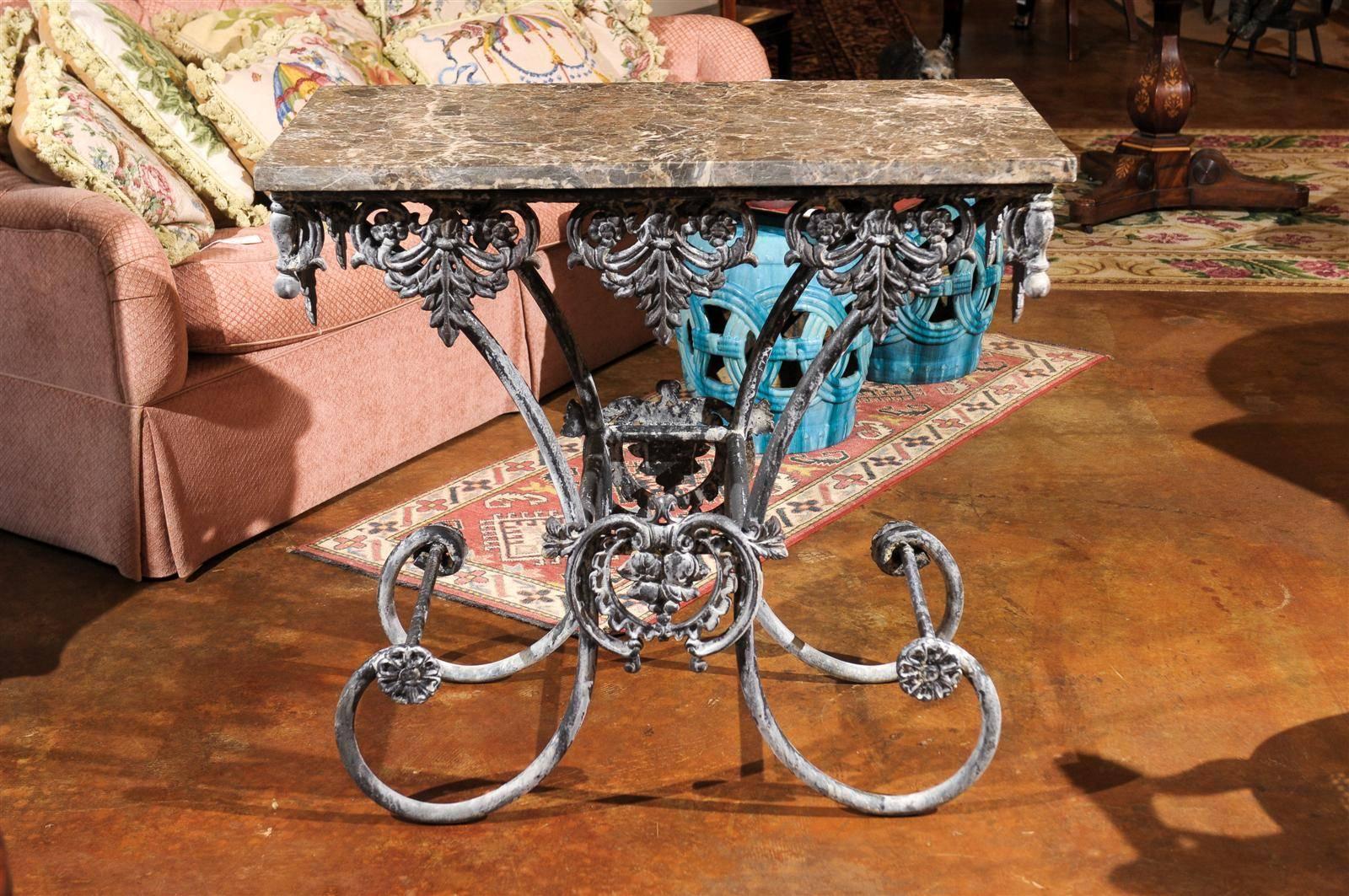 This wonderful pastry table base is hand-forged with an Emperador marble top.
It is a piece that could be used in a variety of spaces throughout the home.