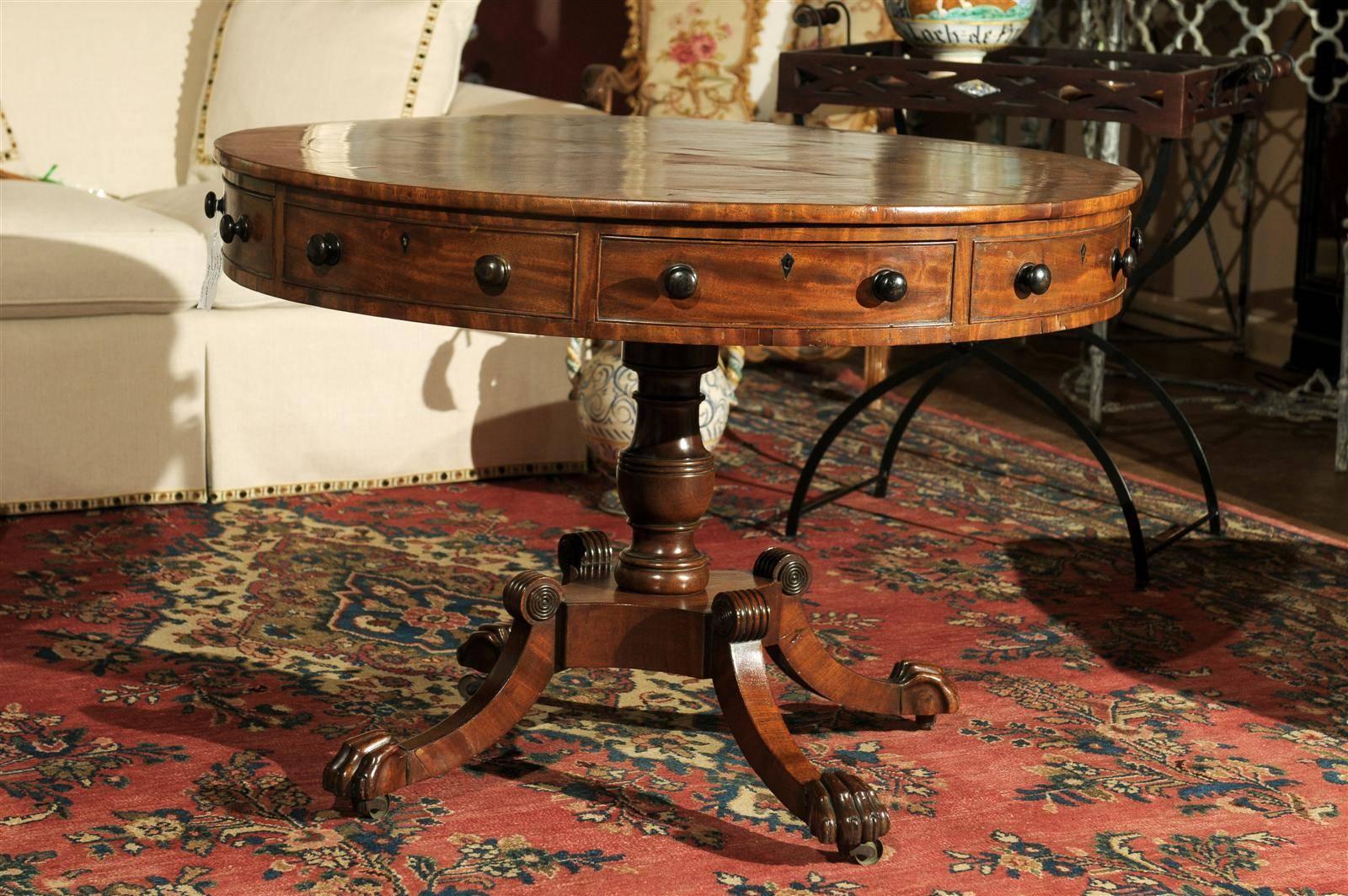 This is a stunning round Regency rent table.  A period in time of great refinement and cultural achievement that shaped and altered the societal structure of Britain. 
For an entrance piece in your foyer or a lovely side table in a library this is a