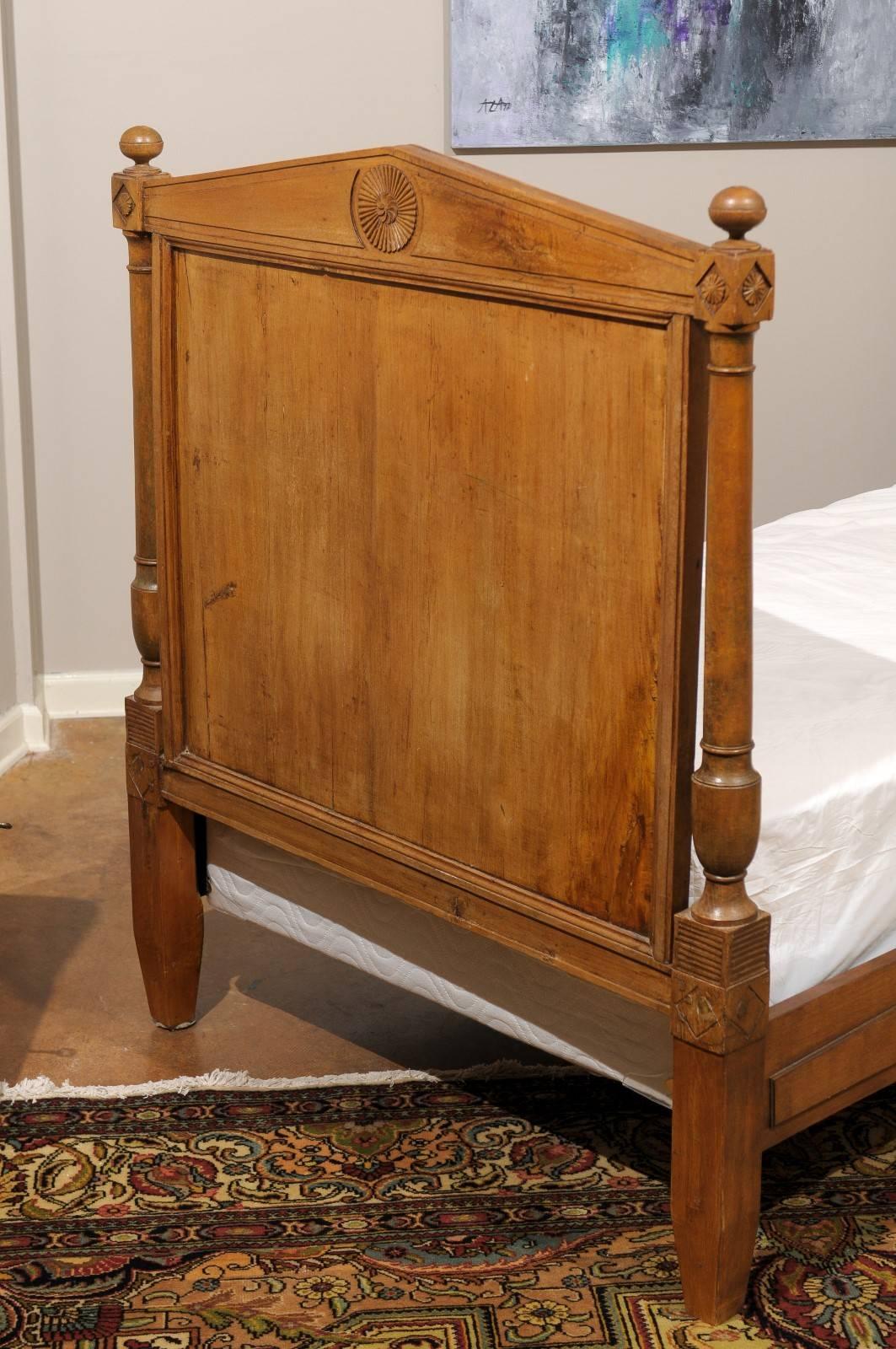 This a an absolute treasure of a daybed. French Empire style,
(circa 1810-1840) light solid walnut that is French countryside. It is finished on both sides, looking at the inside and on its outside. It will fit a twin side bed!

(Does not include