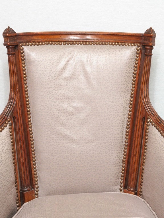 Pair of 18th century French walnut Louis XVI upholstered bergeres