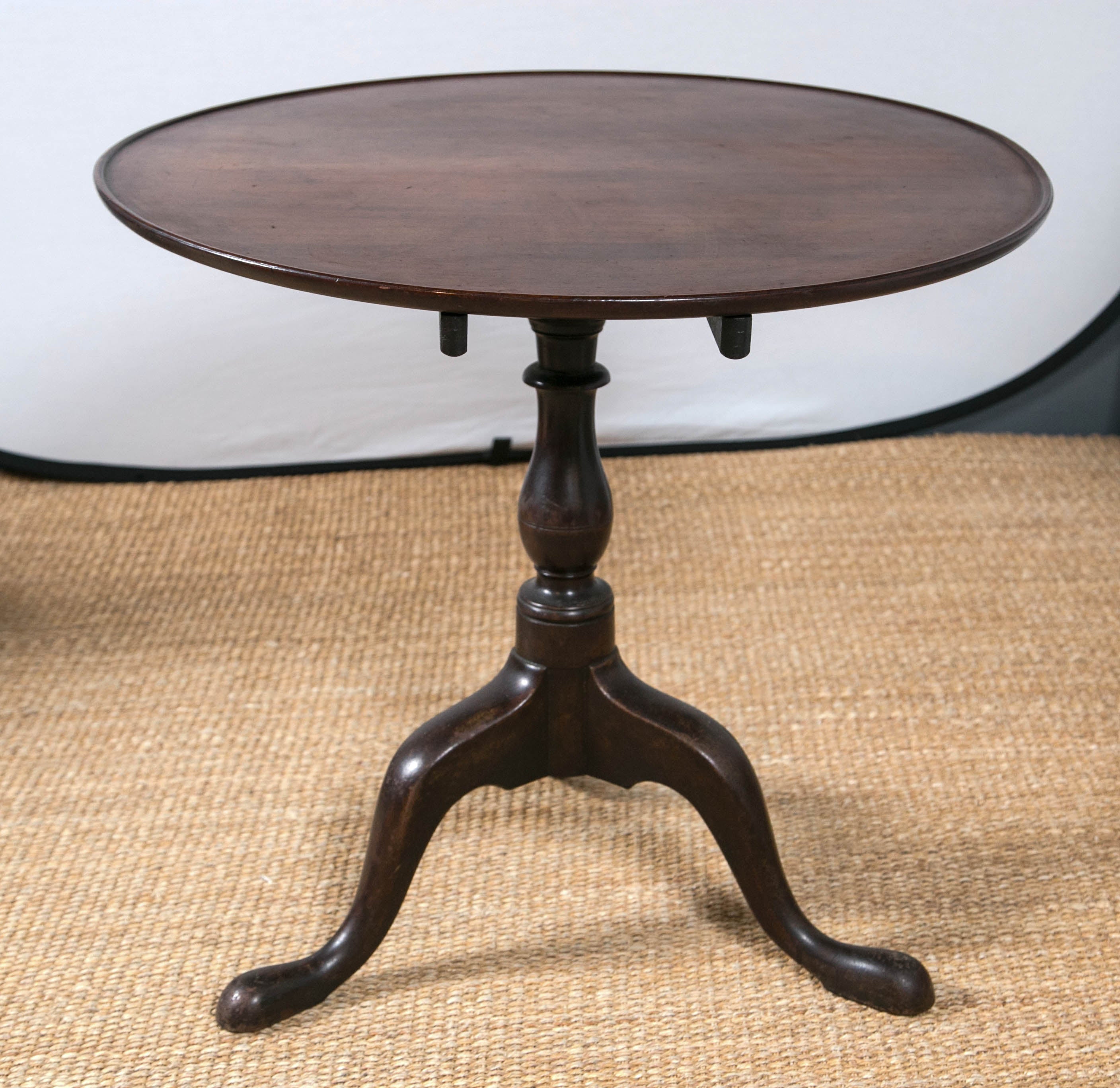 Period  mahogany tilt-top table with great patina.