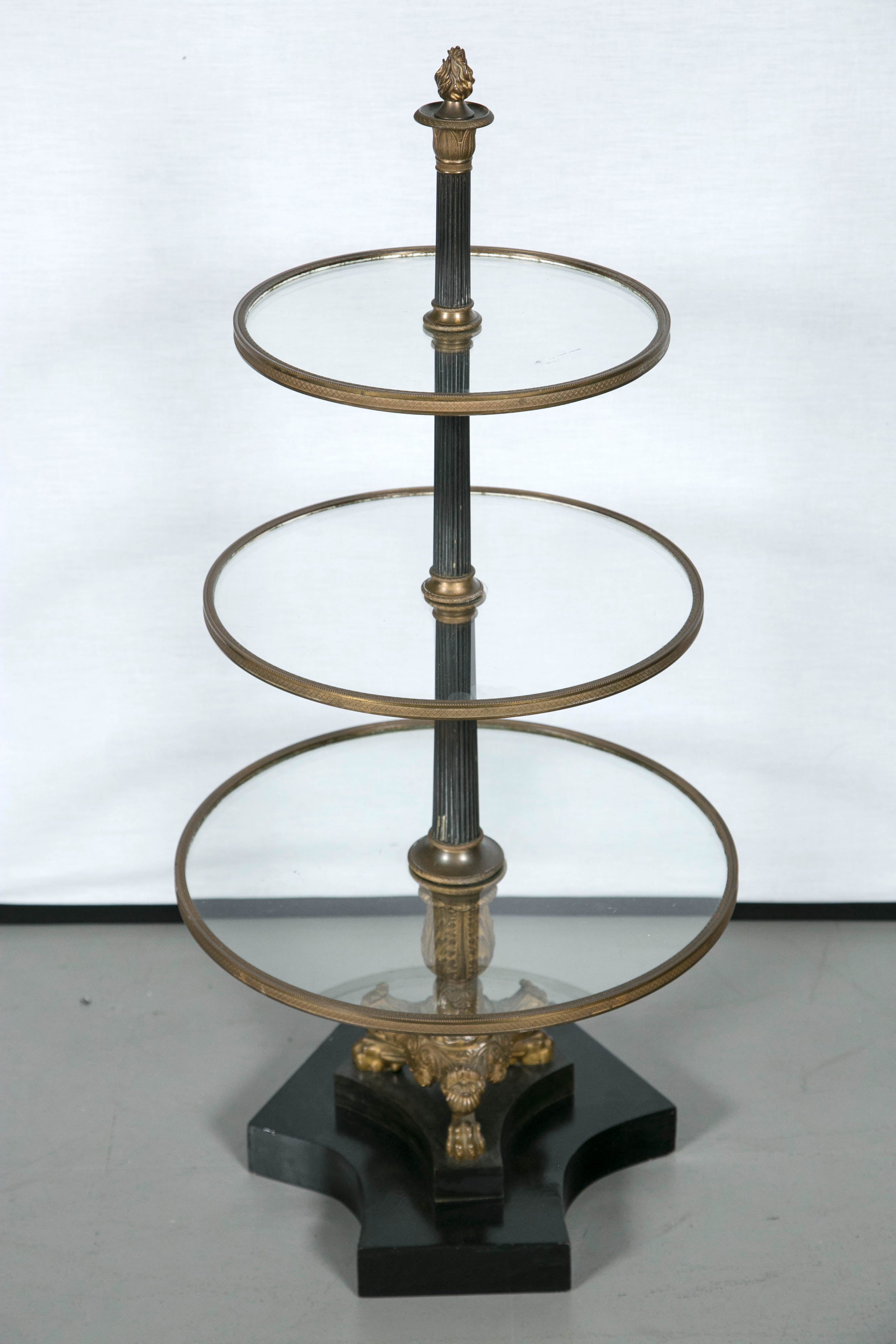 Empire style muffineer with glass shelves and bronze mounts.