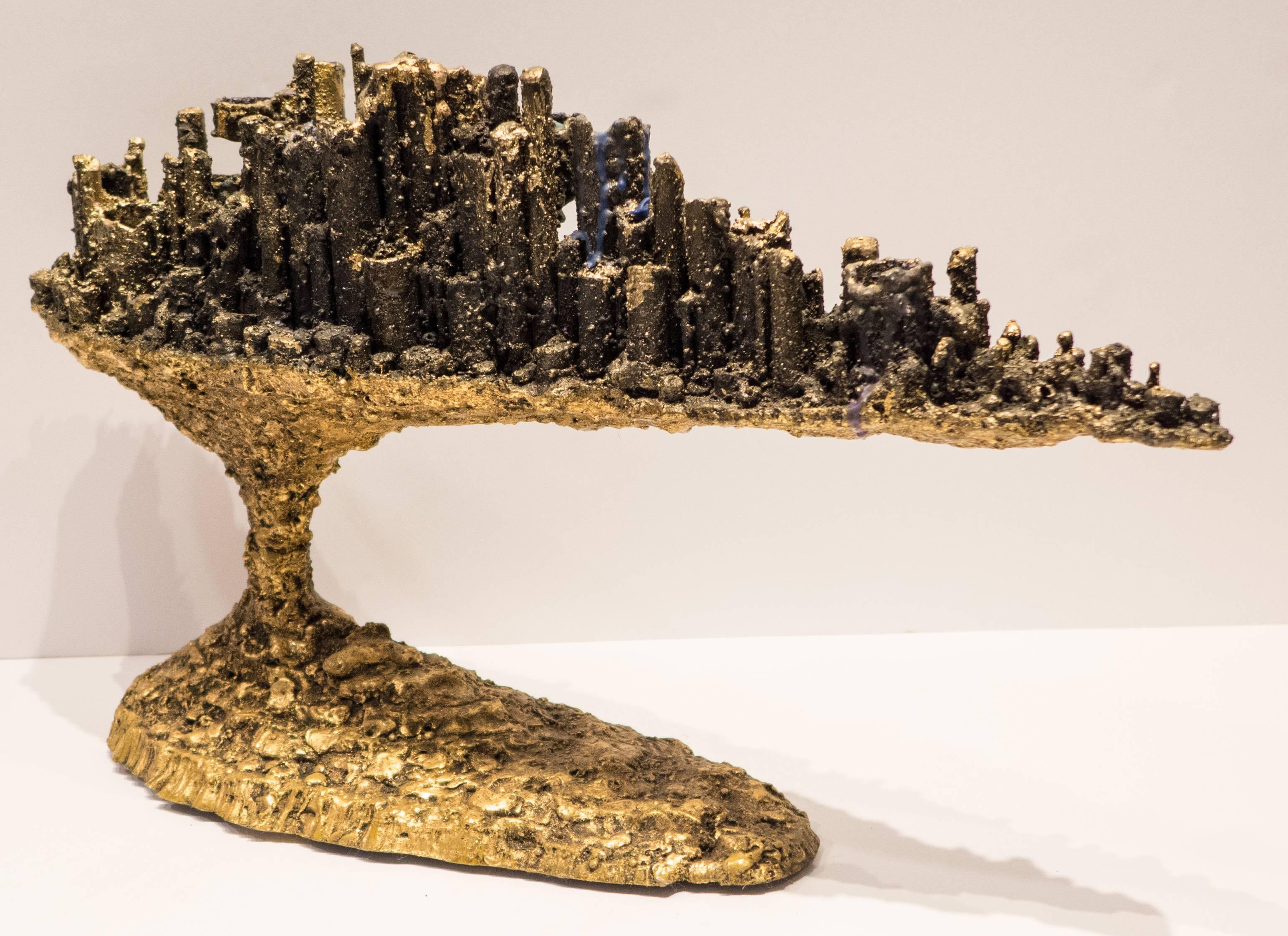 Candelabra of blackened and 24-karat gold gilded steel, with the aspect of an extra-terrestrial or futuristic cityscape. By American artist James Bearden. Bearden's work was featured in a 2020 solo exhibition at the NY Design Center titled 