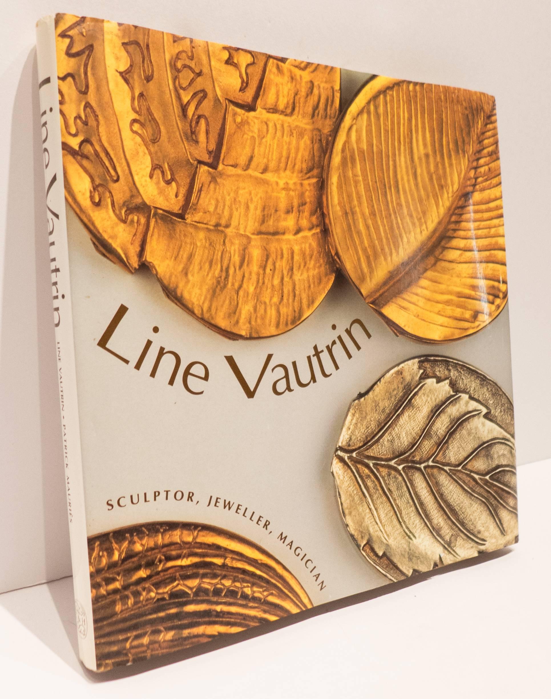 Lin Vautrin: Sculptor, Jeweller, Magician.  First American edition, hardcover in dustjacket, published by Thames and Hudson in 1992.  112 pages, featuring 76 pages of illustrations, 72 of them in color--over 200 objects plus commentaries.  A