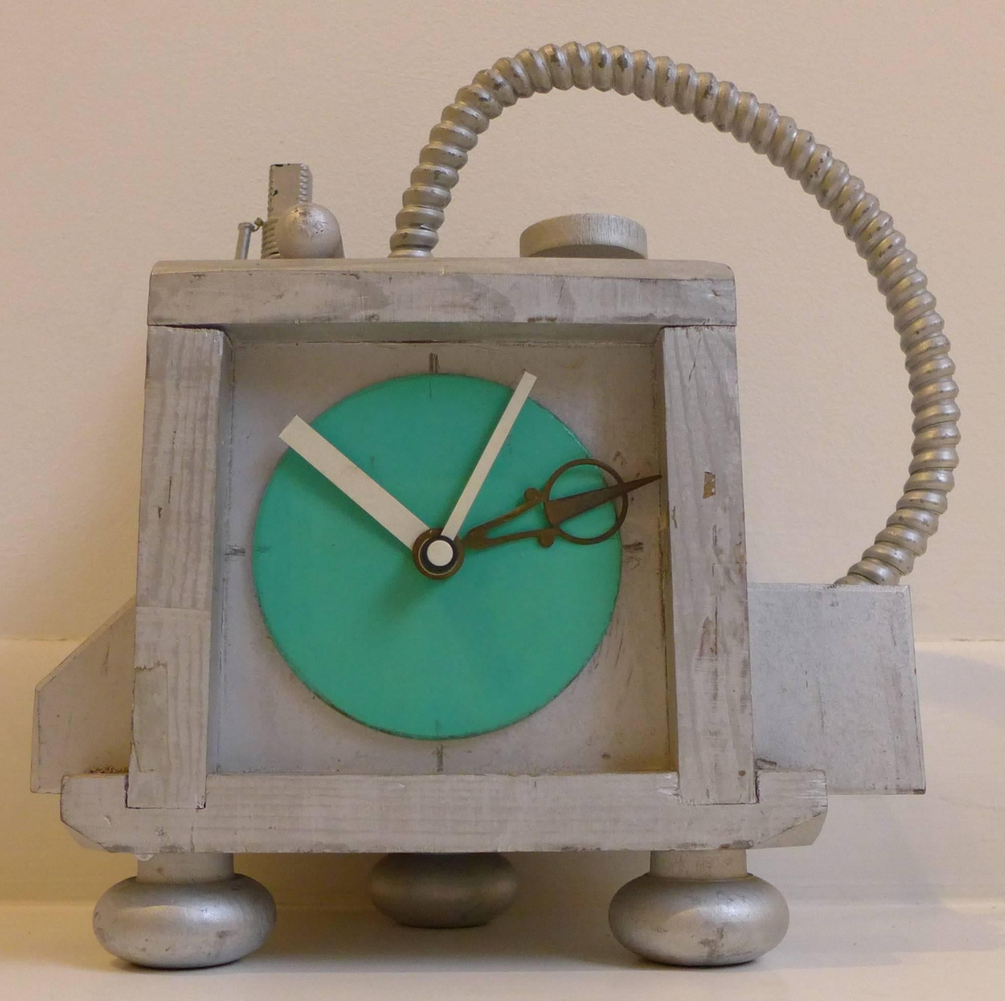 Relatively restrained fantasy clock by New York City artist Richard Birkett. An early example of Birkett's post-modernist, steampunk oeuvre, dated 1985 (he began making these clocks in 1984). Birkett recycled industrial debris such as machine parts,