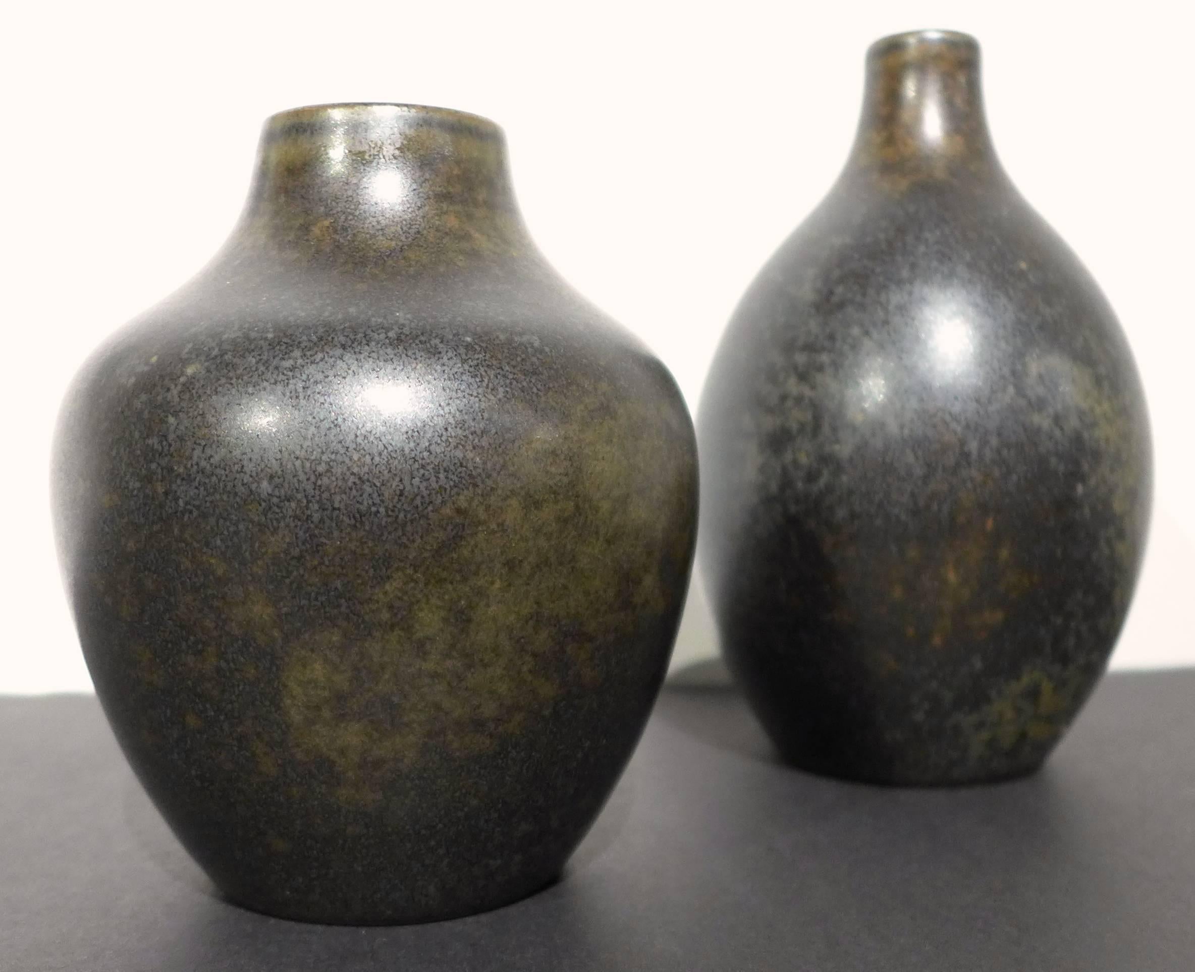 Group of five vases ranging in height from 4.5