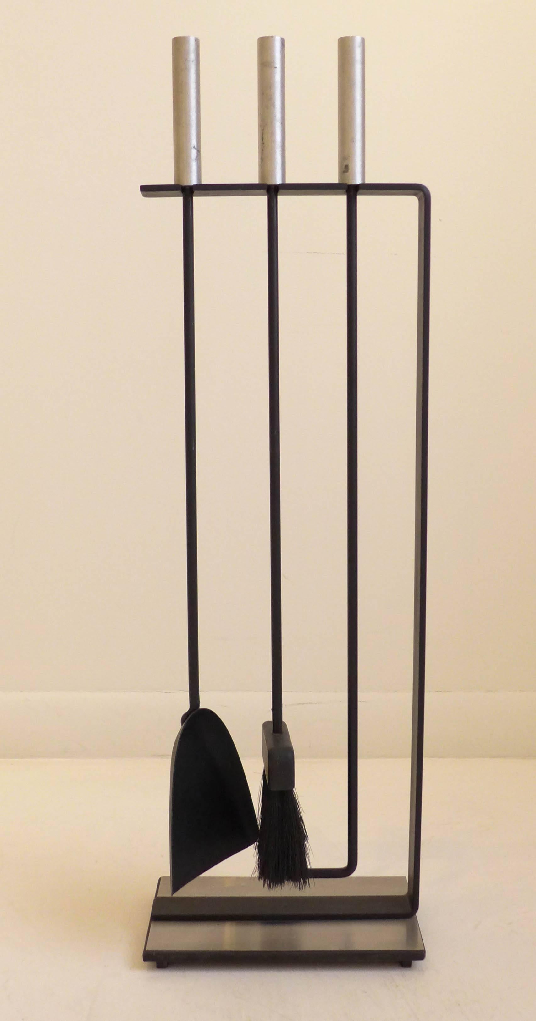 Modernist fireplace tool set of enameled steel, aluminum, and fiber. Comprising a poker, shovel, and brush. Attributed to Pilgrim manufacturing, circa 1960s.