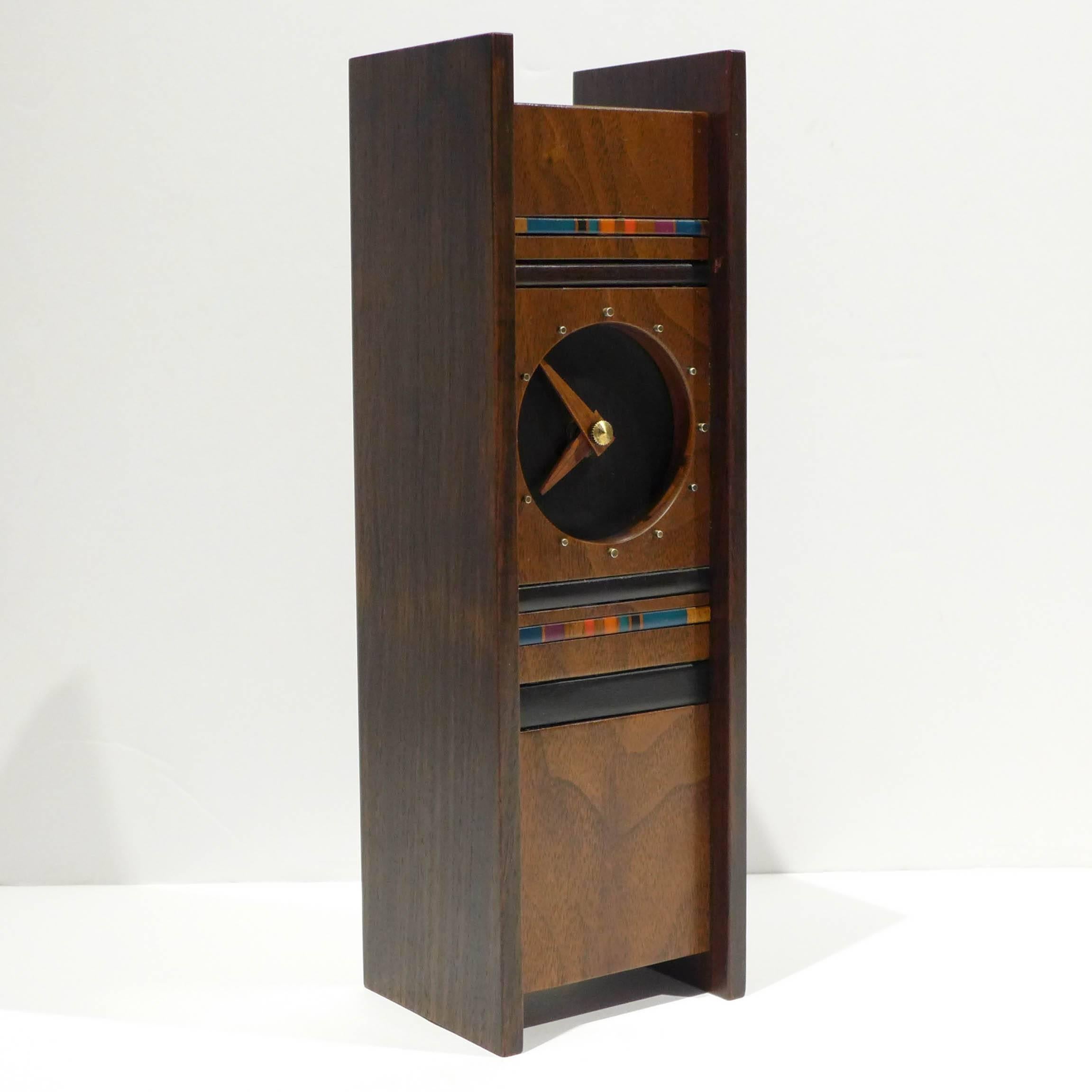 Seldom-seen table clock by San Francisco Bay artisan Robert McKeown (1931-1989). A graduate of the California College of Arts and Crafts, McKeown was a color theorist and woodworker who won acclaim for his innovative resin inlays on a range of