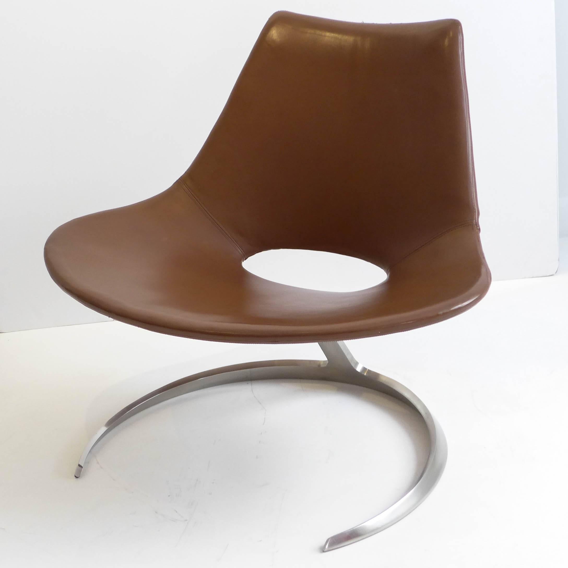 Early edition of the iconic Scimitar chair in stainless steel and leather by the Danish design team Preben Fabricius and Jorgen Kastholm. Produced by Ivan Schlechter, Copenhagen, circa 1960s. Embossed mark underneath.