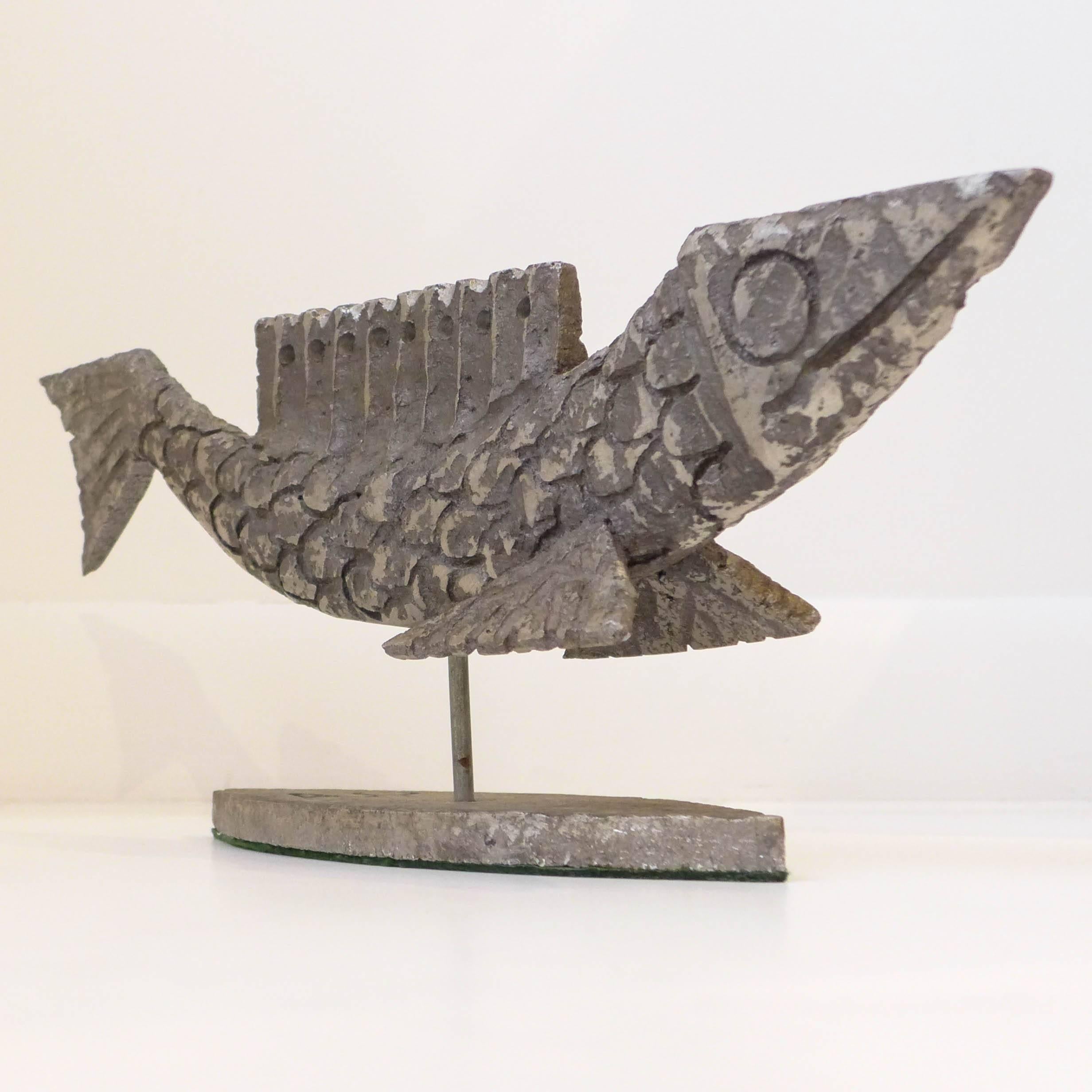 Brutalist fish sculpture of cast aluminum mounted on a cast aluminum base. In the style of Donald Drumm. Made circa 1960s; with the initials 