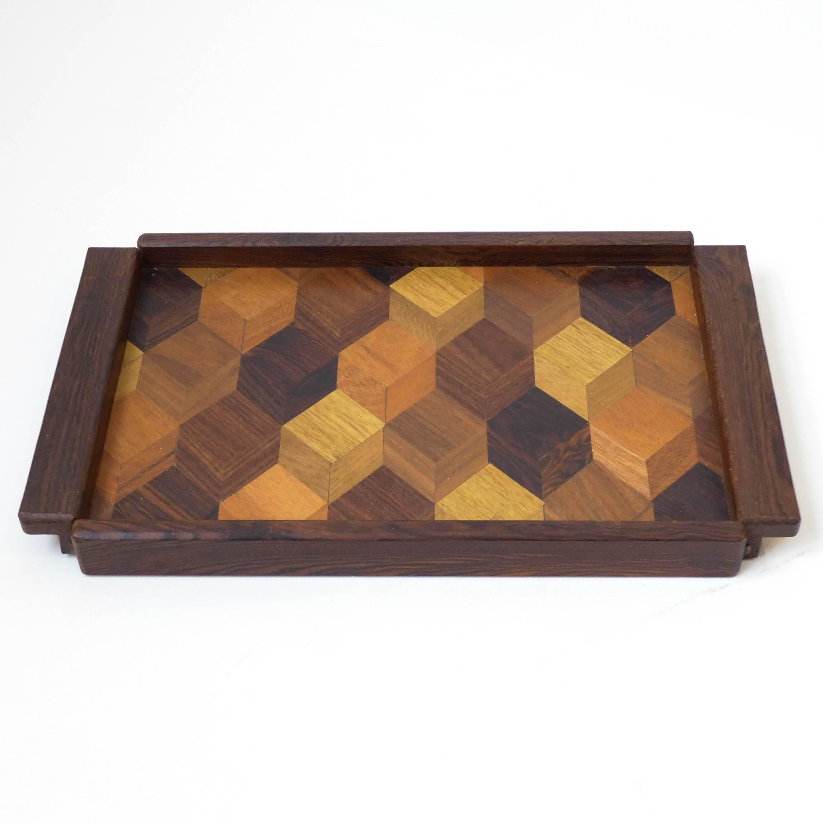 Quintessential Don Shoemaker tray, with cocobolo edges and a trompe l'oeil pattern of inlaid exotic woods in the center. A fine example of Shoemaker's design, in excellent original condition. From his Senal S.A. studio, Morelia, Mexico, circa 1960s.