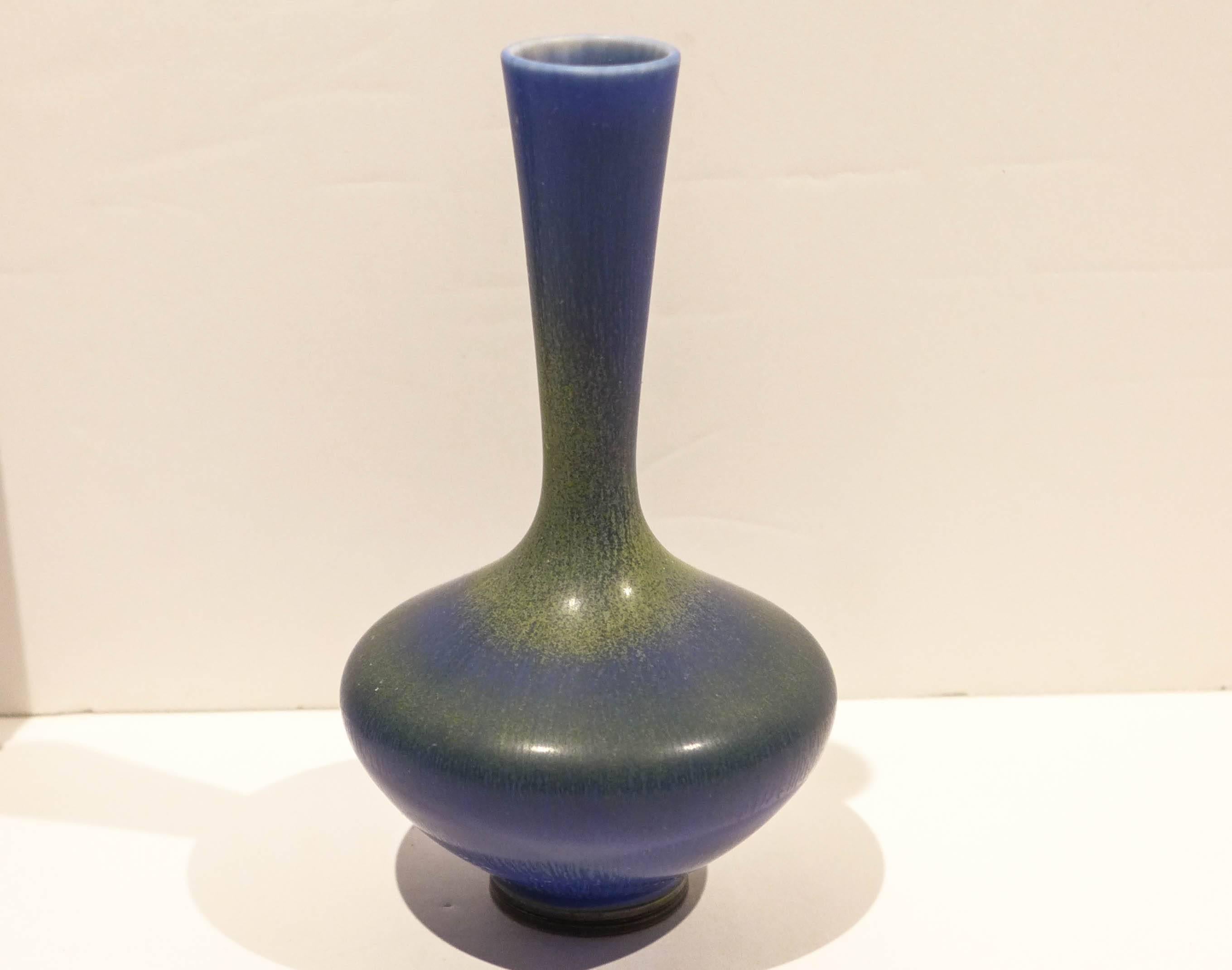 Hand-thrown and glazed studio vase with bulbous body and flaring neck. With a vivid blue/green multi chromatic hare's fur matte glaze. By eminent Swedish ceramist Berndt Friberg, made at Gustavsberg, circa 1964.