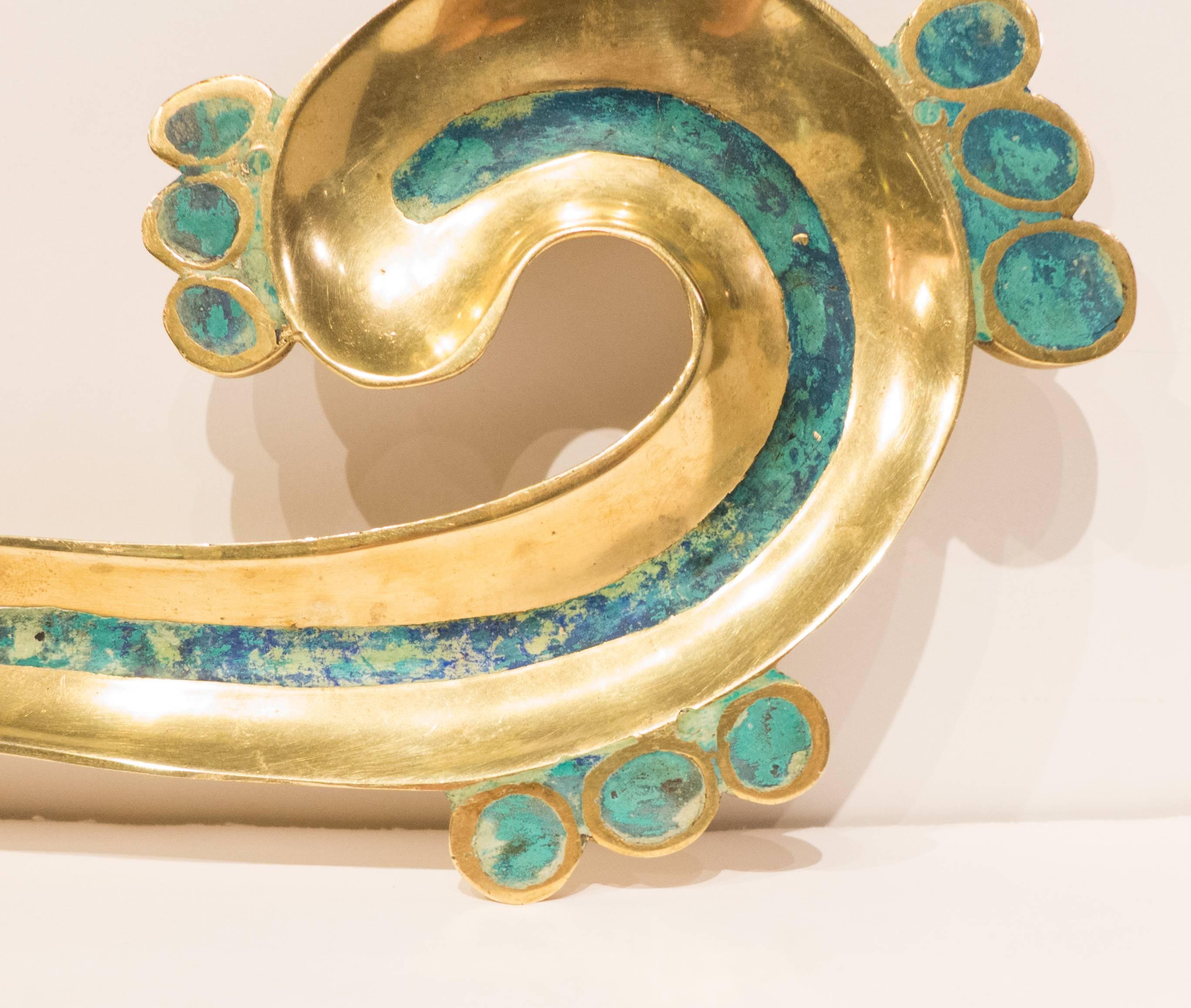Eccentric-shaped dish or tray of cast brass with inlaid turquoise color ceramic. By Mexican designer/artist Pepe Mendoza, circa 1960s. With impressed marks.