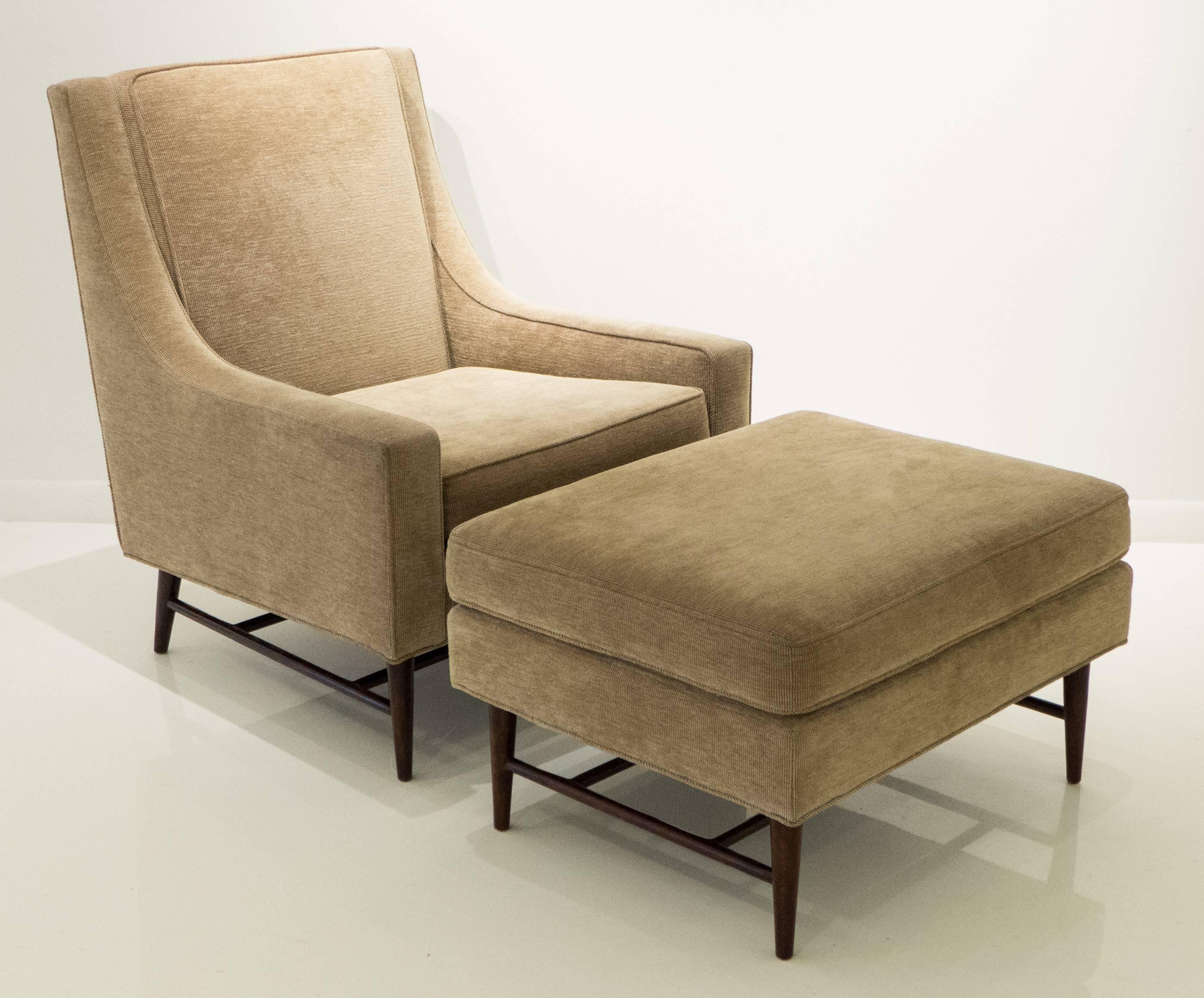 High-back lounge chair (model #468) with mahogany legs and cross-stretchers; along with the corresponding ottoman (model #468A). Designed and produced by Harvey Probber, c. 1950's. Reupholstered in the past eight years. A substantial and comfortable