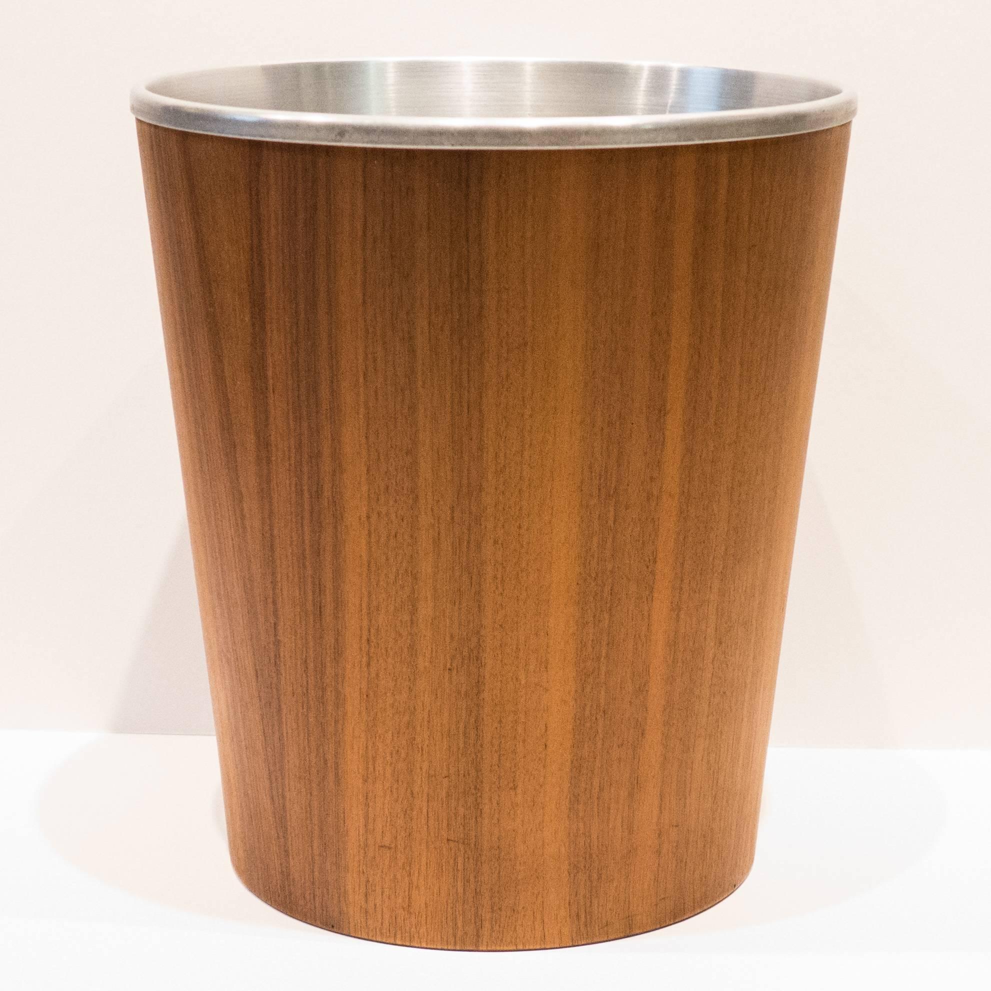 Teak wastebasket with spun aluminium insert. Designed by Martin Aberg for Servex and made in Sweden, circa 1960s. Measure: The diameter at the base is 7.75