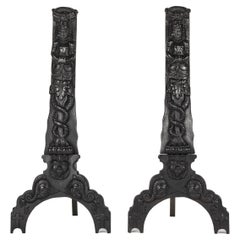 1920s Black Cast Iron Andirons with Figures of a Hybrid Atlas over a Caduceus