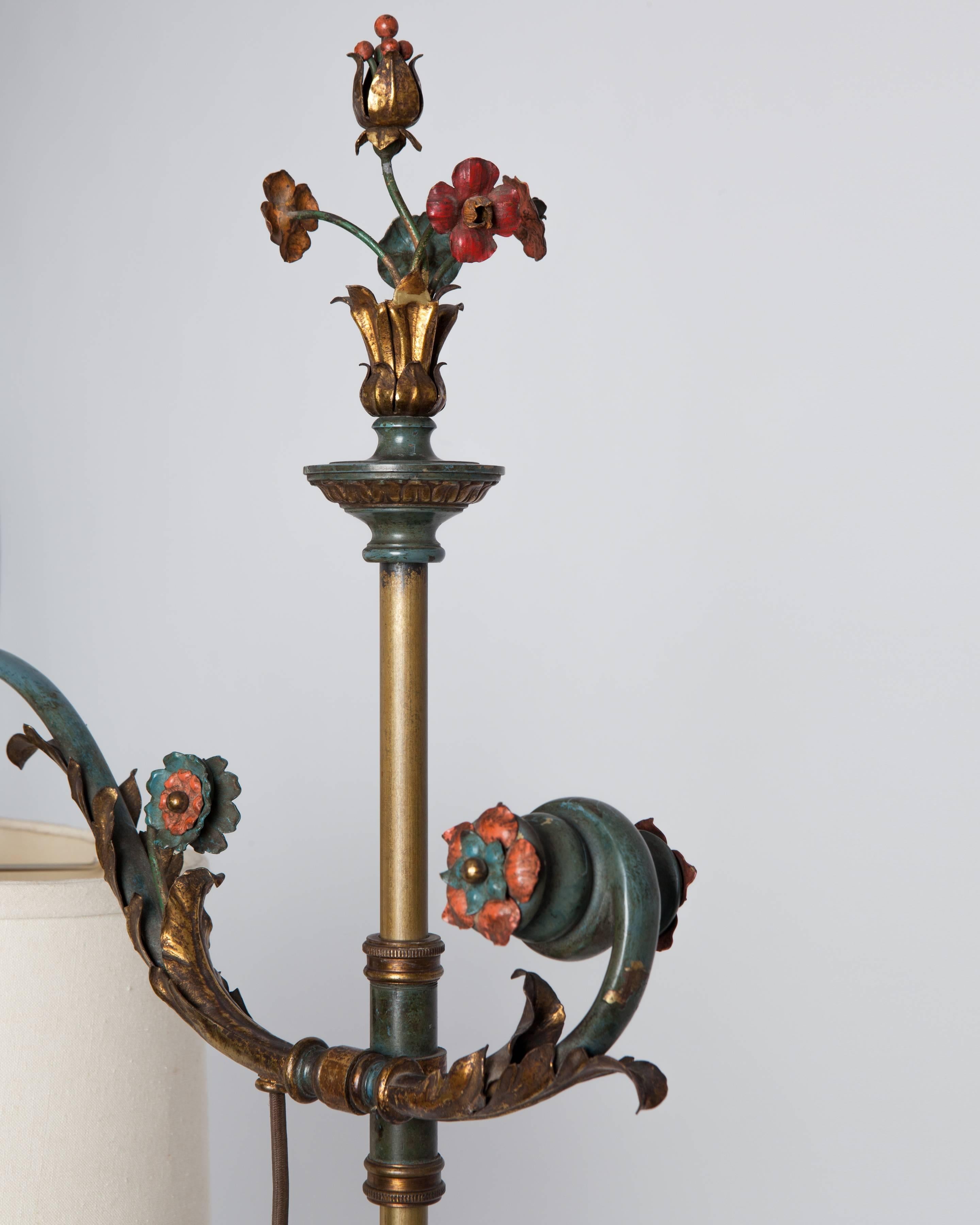 AFL1832.

An antique bronze bridge-arm floor lamp in its original pale blue and gilded finish. The arm pivots and adjusts in height by the New York maker Sterling Bronze Co. Shade not included.

Dimensions:
Overall (extended): 64-1/2