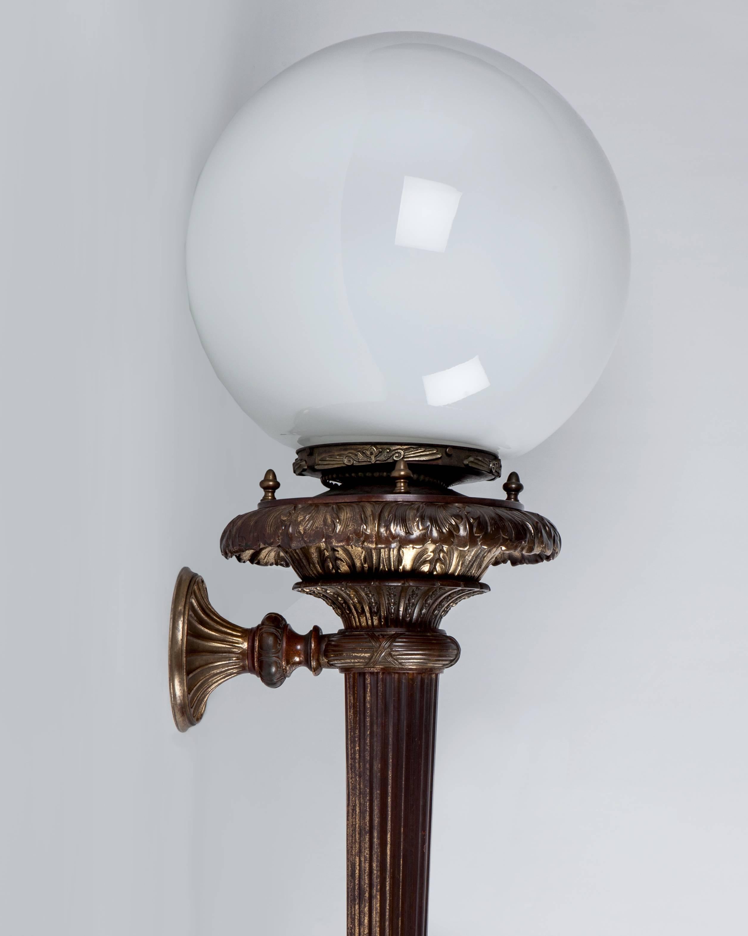 American Cast Bronze Empire Style Wall Sconces with Opal White Glass Globes, Circa 1900s For Sale