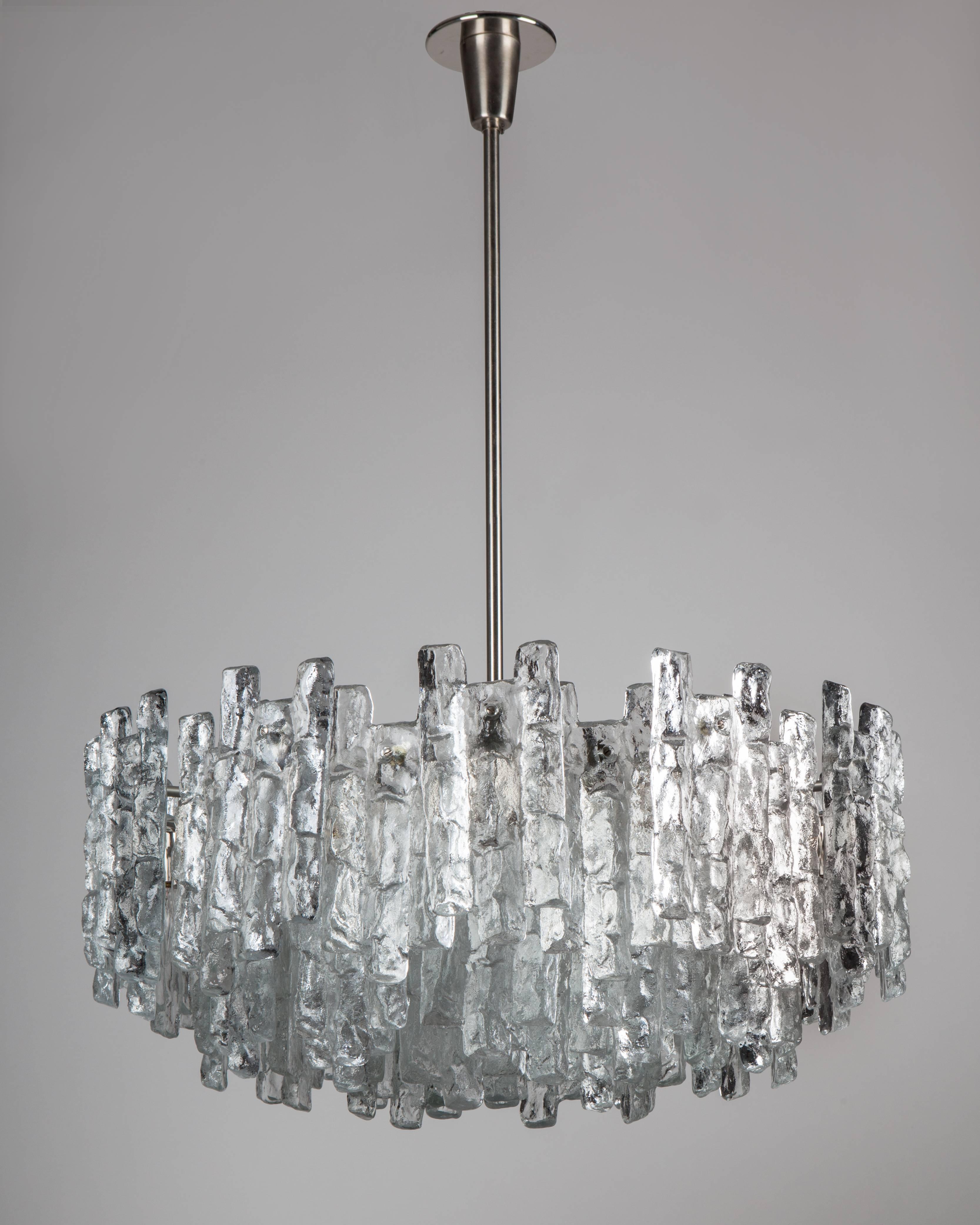 AHL3993

An exceptionally large vintage mid century modern ice chandelier with old nickel metalwork by the Austrian glassmaker Kalmar. Due to the antique nature of this fixture and there may be some nicks or imperfections in the