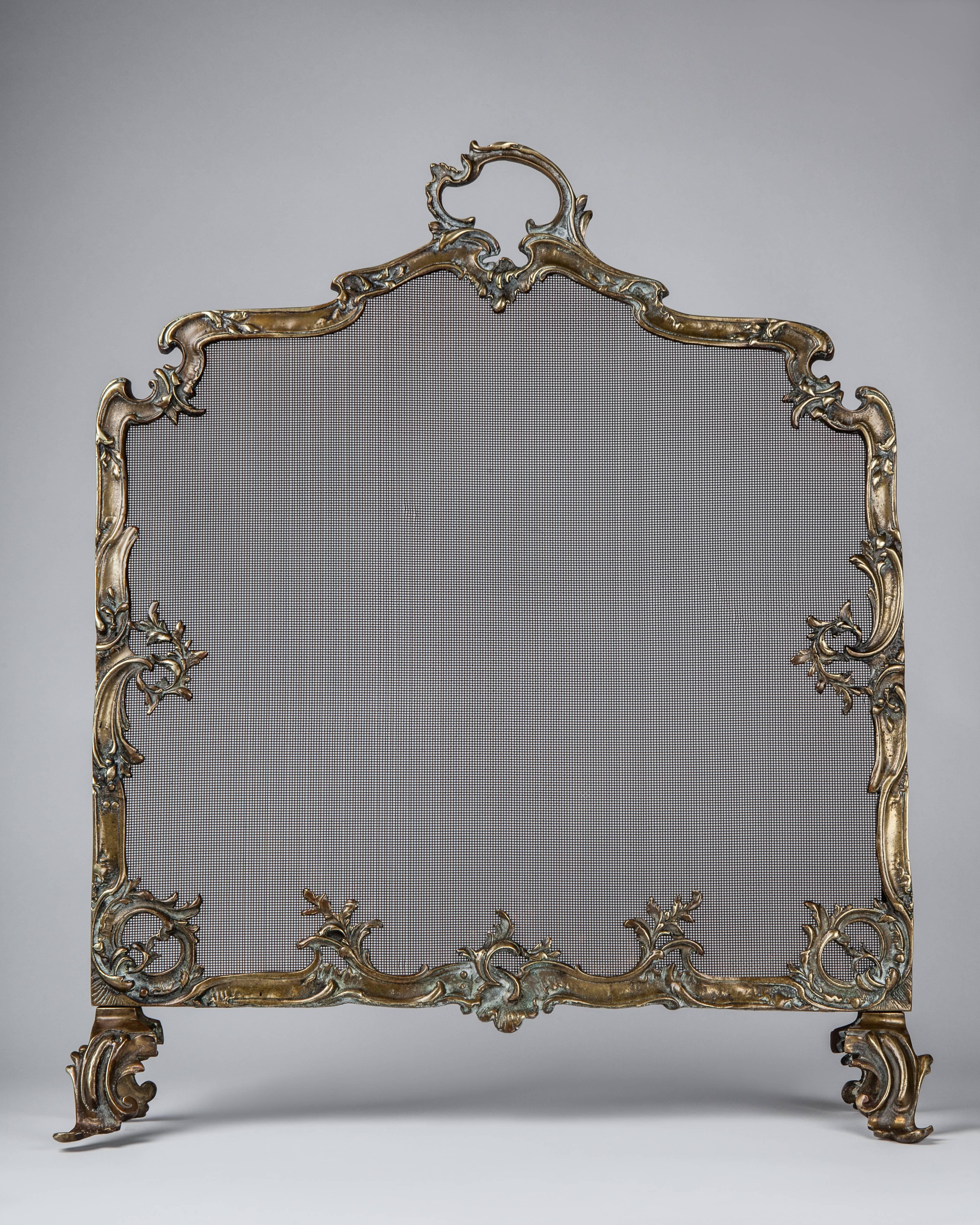 AFP0530
An antique bronze Louis XV fireplace screen with iron mesh.

Dimensions:
Overall: 31-1/2