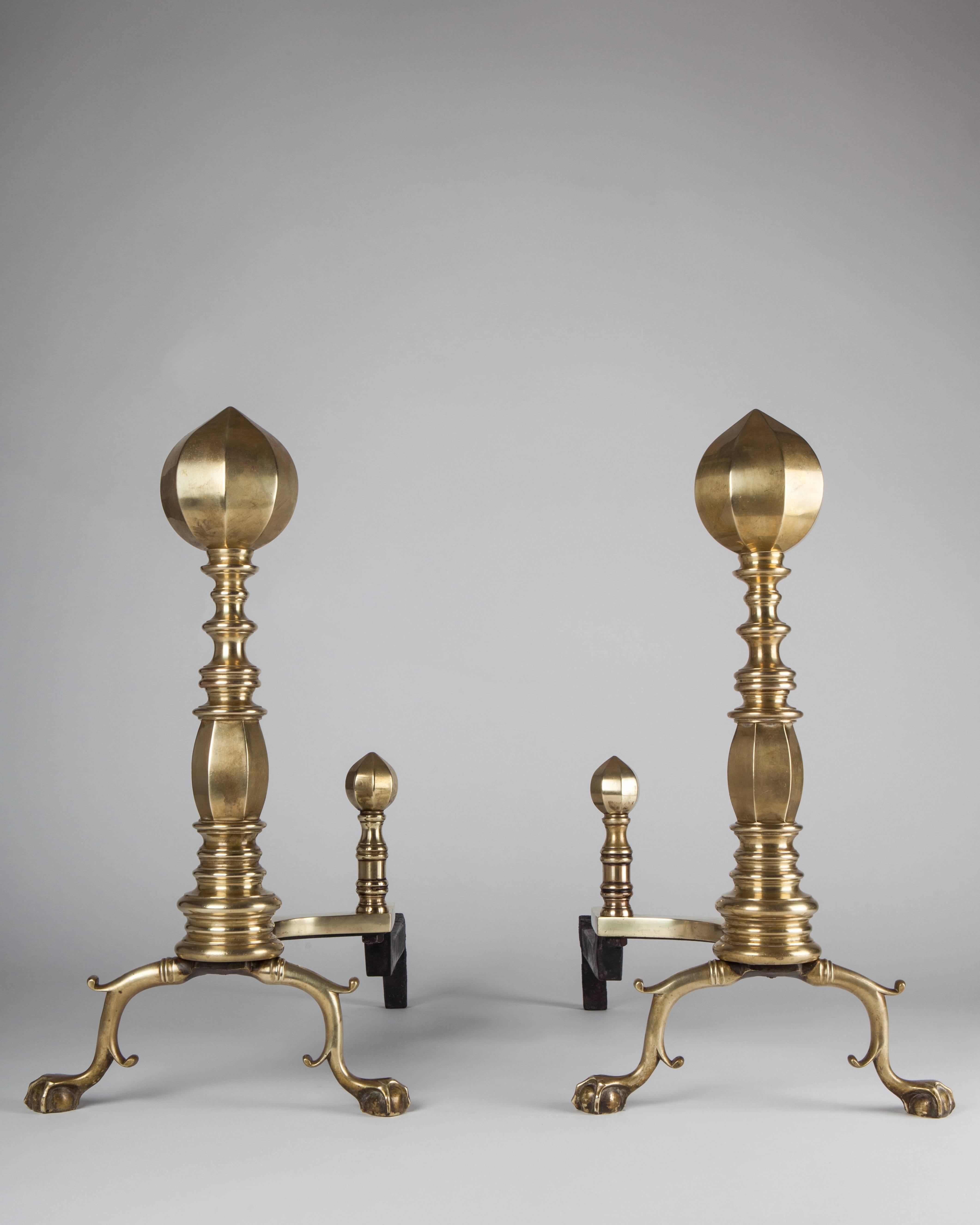 AFP0538.
A pair of large antique brass and wrought iron baroque andirons with matching log-stops.

Dimensions:
Overall: 23