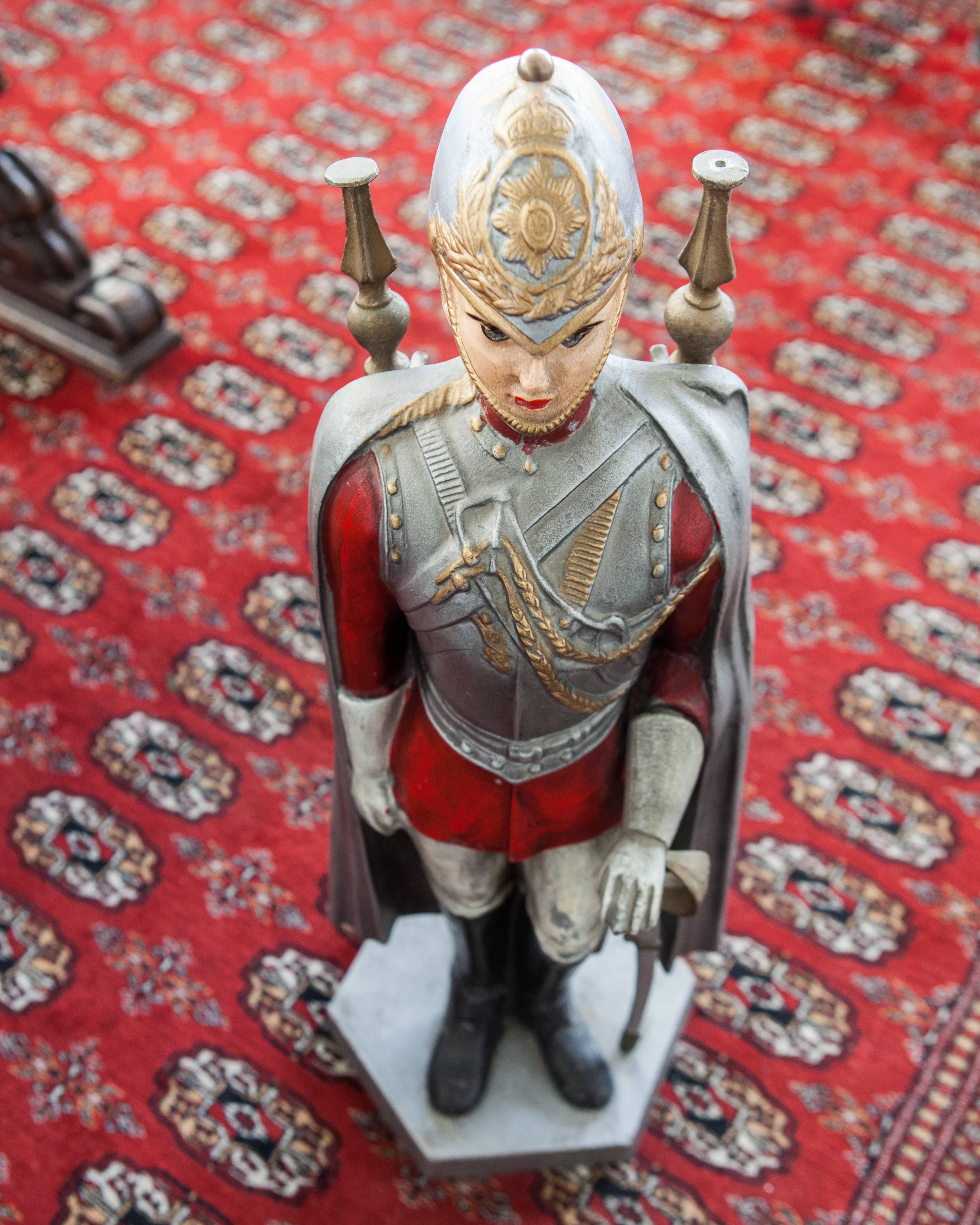 Cast Fireplace Tool Set with Metal Stand in the Form of a Standing Sentry, Circa 1950 For Sale