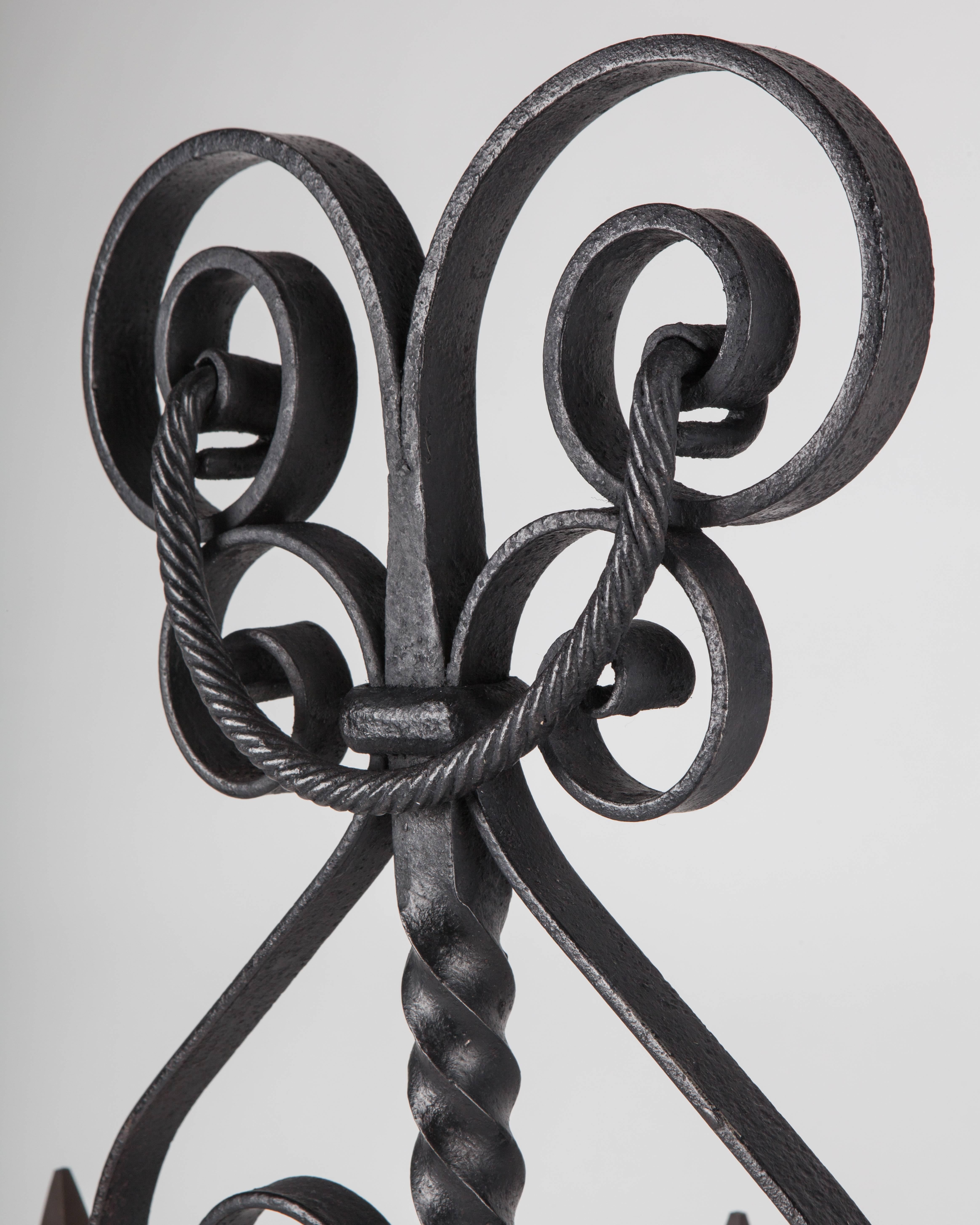 Rustic Wrought Iron Andirons with Scrolls and Twisted Central Fender Crossbar, c. 1880s For Sale