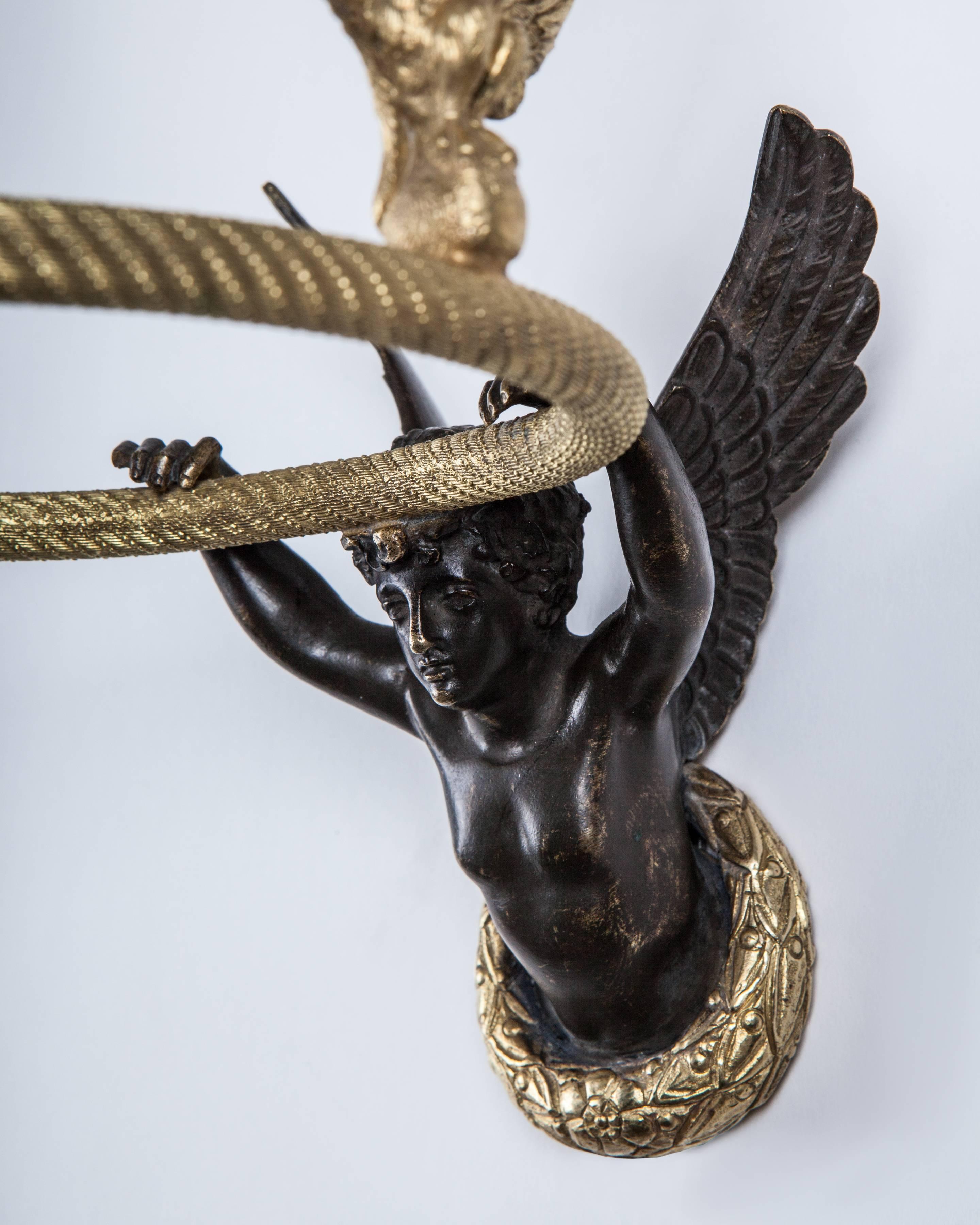 Gilded Empire Hoop Sconce for Candles with Winged Figure and Three Eagles, 1860s In Good Condition For Sale In New York, NY