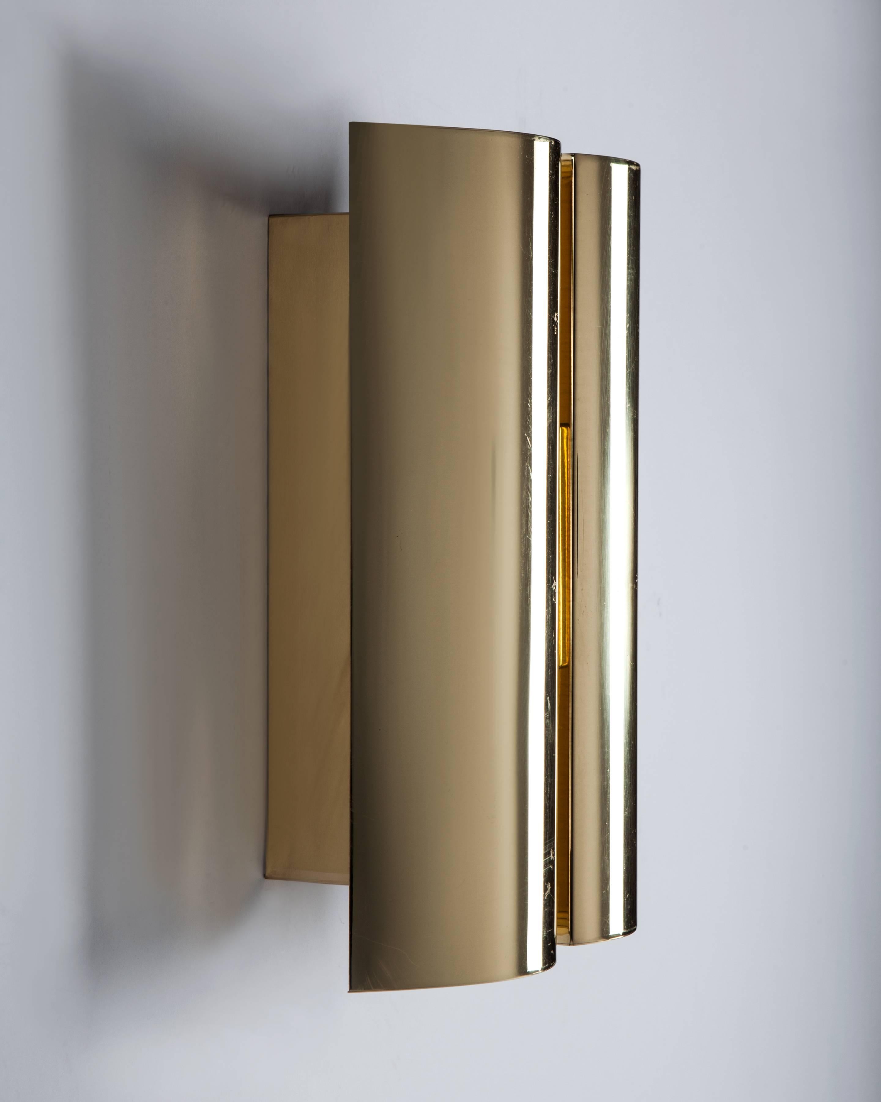 AIS3015
A pair of vintage wall sconces in their original lacquered brass finish. Signed by the Swedish maker Fagerhults.