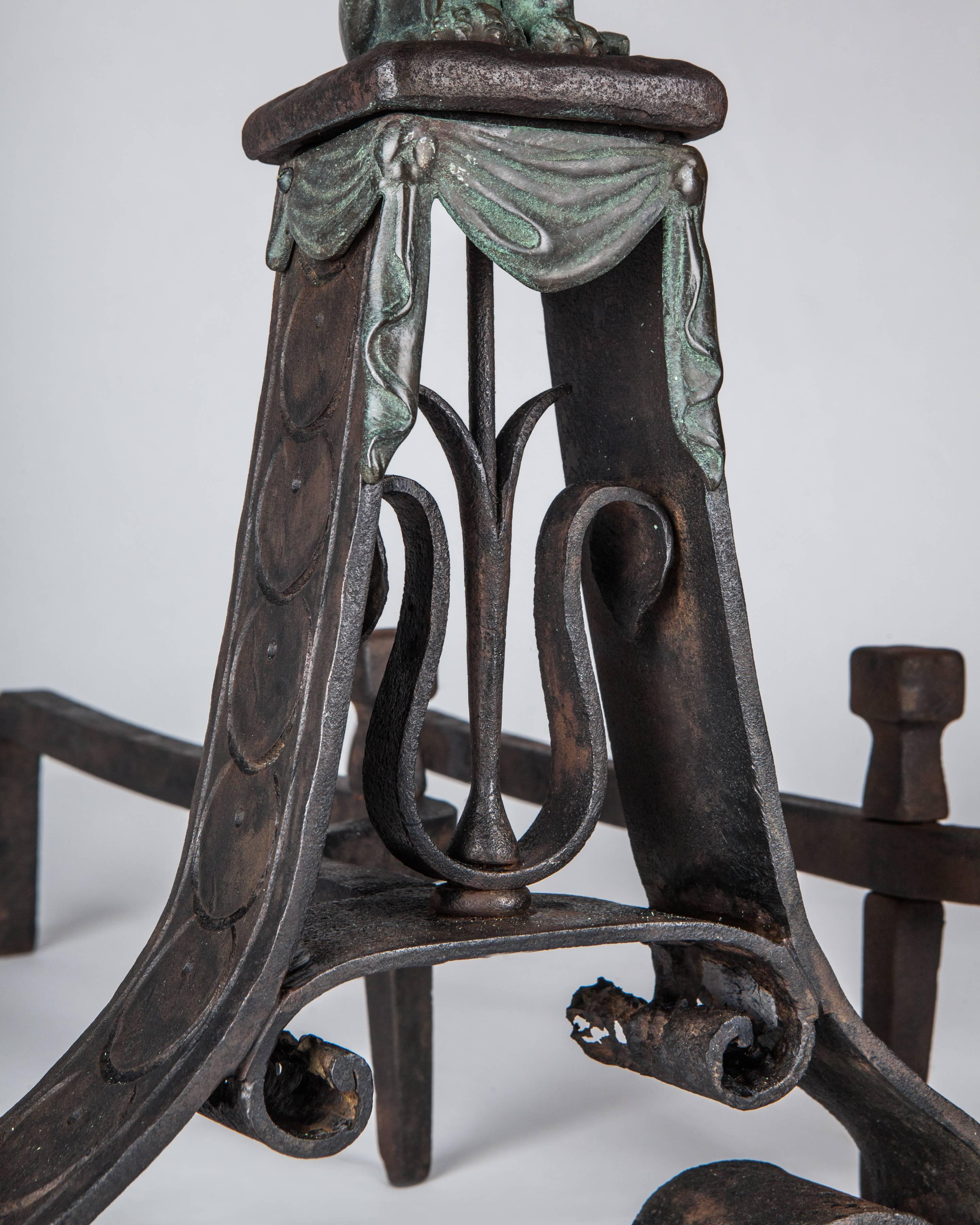 American Wrought Iron Andirons with Cast Bronze Lions in a Verdigris Patina, Circa 1910s For Sale